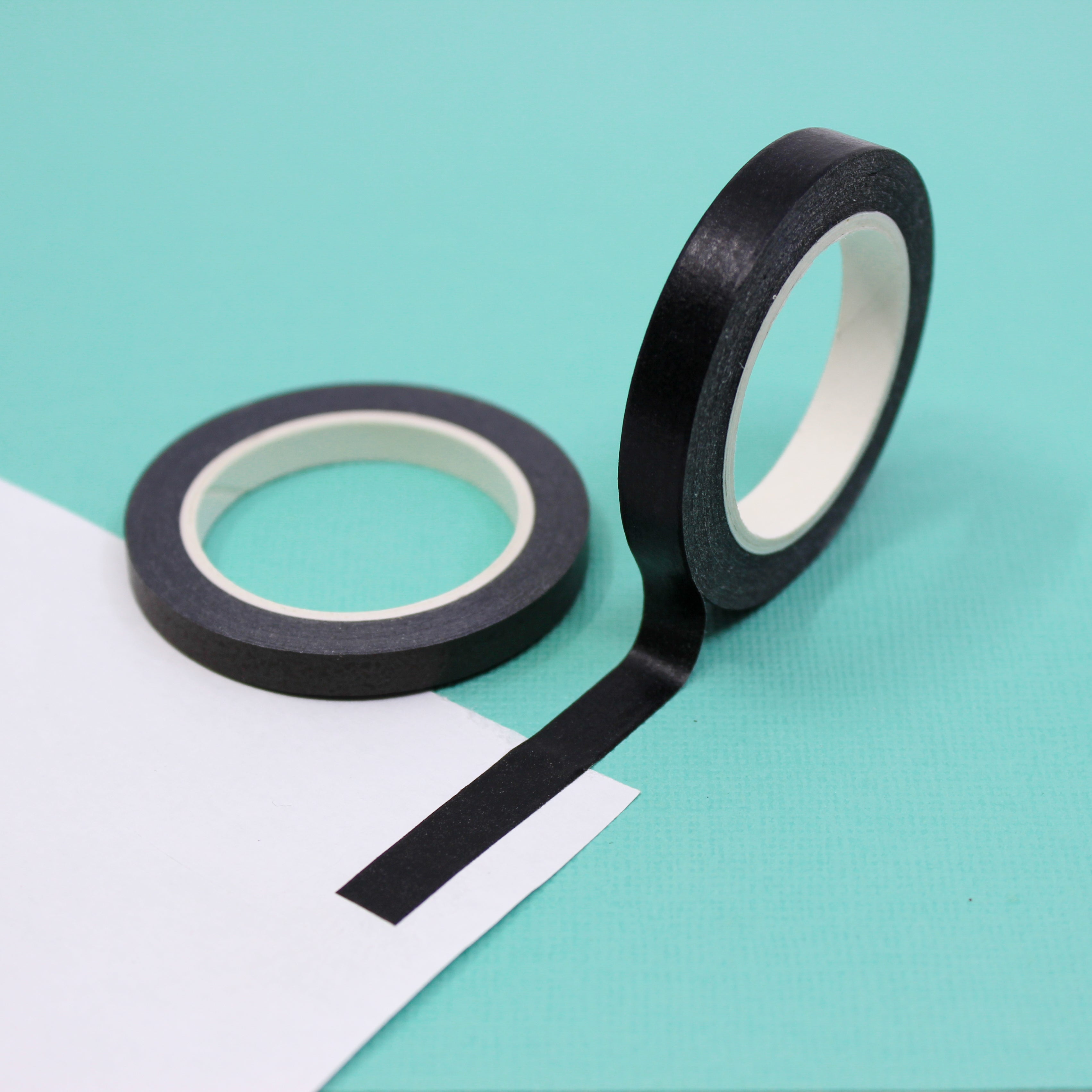 Enhance your crafts with our solid black washi tape, featuring a sleek and versatile design in a classic black hue, perfect for adding depth and contrast to your projects. This tape is sold at BBB Supplies Craft Shop.