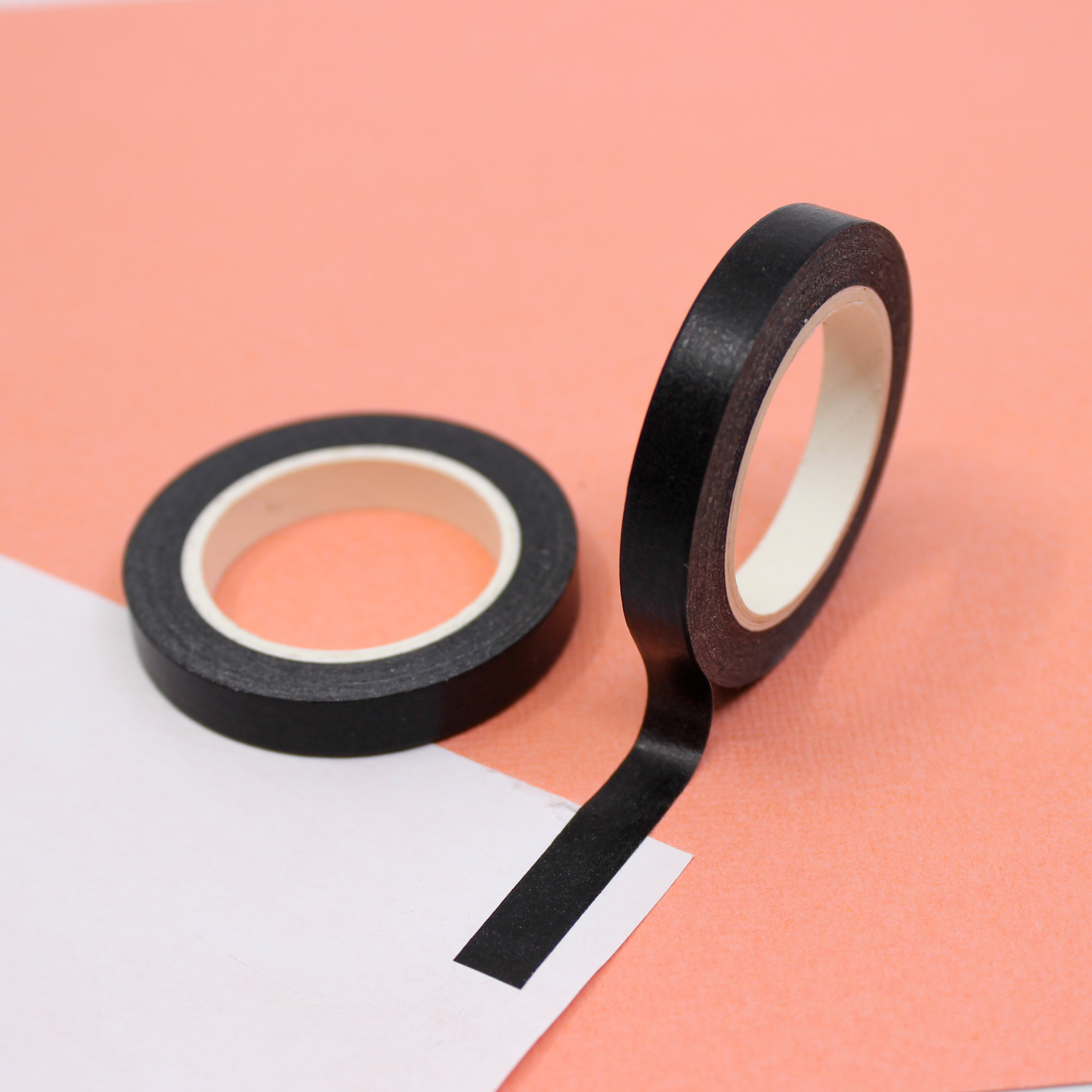 Enhance your crafts with our solid black washi tape, featuring a sleek and versatile design in a classic black hue, perfect for adding depth and contrast to your projects. This tape is sold at BBB Supplies Craft Shop.