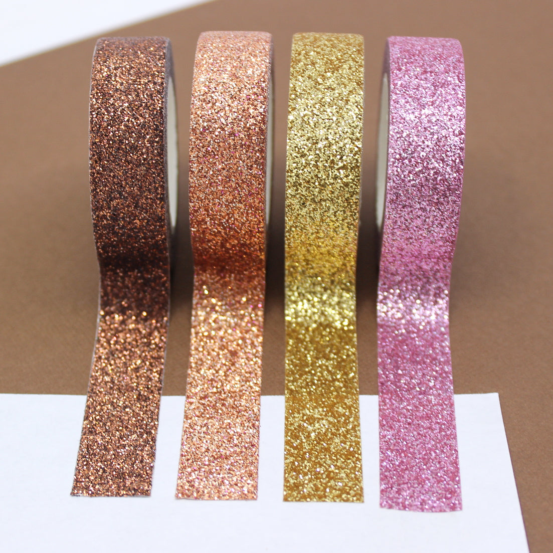 Embrace the warmth of autumn with our glittering washi tape in autumn colors, featuring a blend of rich hues and sparkling glitter, perfect for adding a touch of seasonal magic to your crafts. These Glitter Tapes are sold at BBB Supplies Craft Shop.
