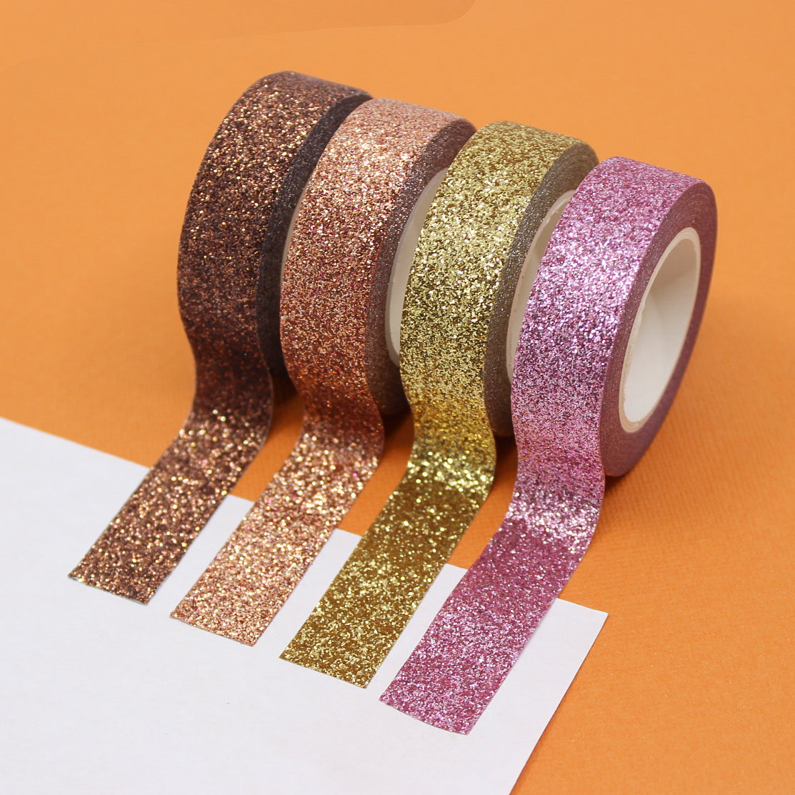 Embrace the warmth of autumn with our glittering washi tape in autumn colors, featuring a blend of rich hues and sparkling glitter, perfect for adding a touch of seasonal magic to your crafts. These Glitter Tapes are sold at BBB Supplies Craft Shop.