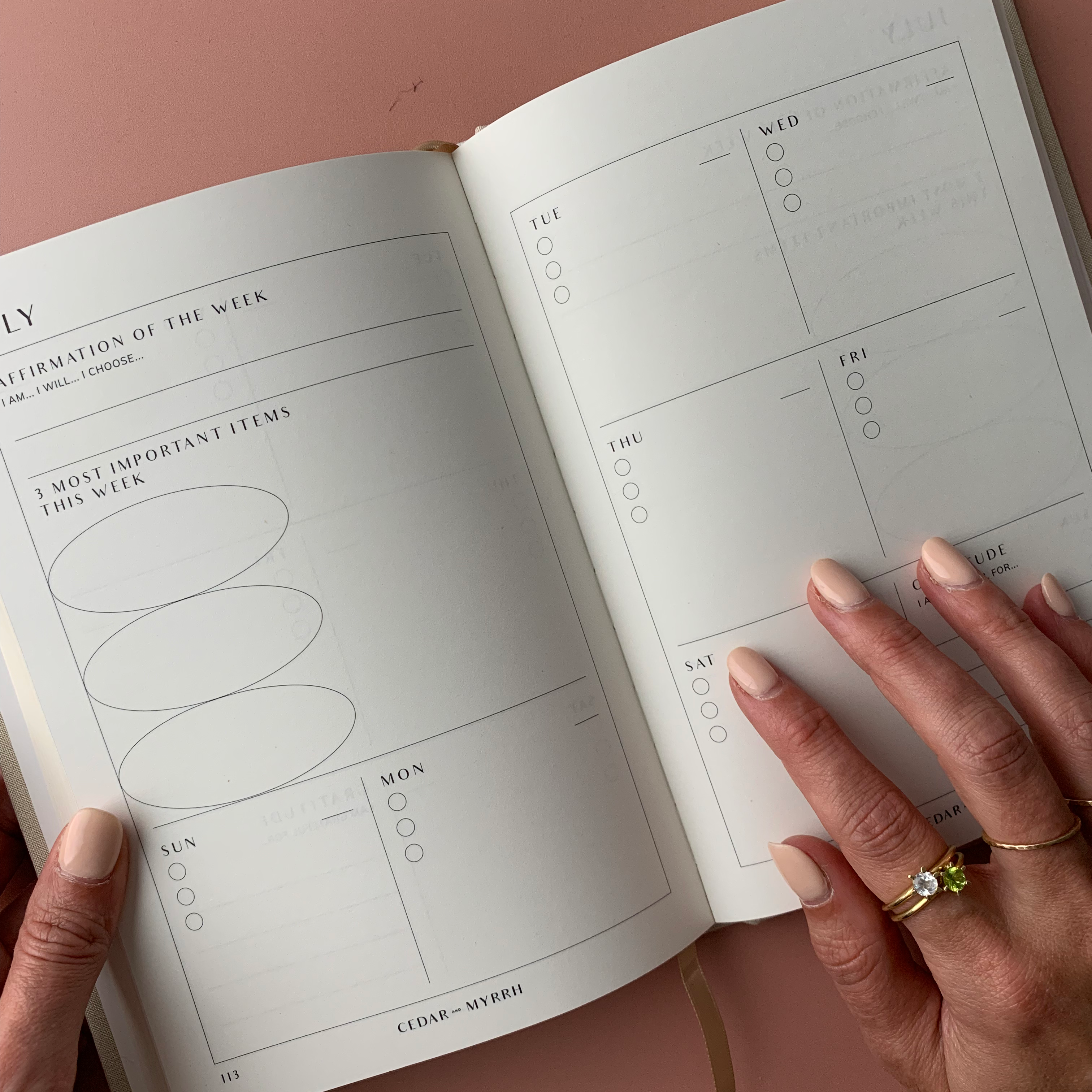 Living with Intent Journal featuring guided prompts for mindfulness, self-reflection, goal-setting, and daily habit tracking for a purposeful and intentional life.