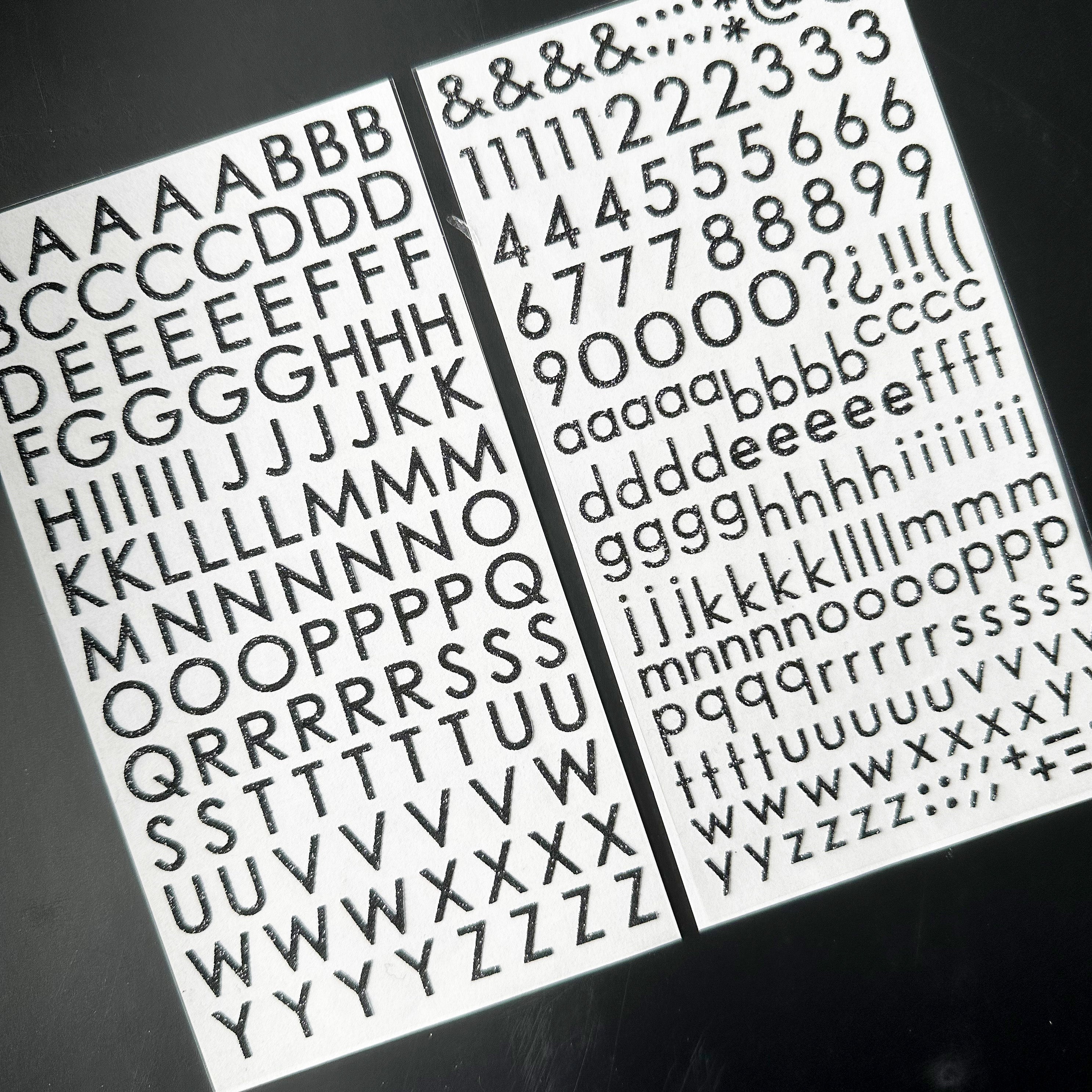 Get creative with our glitter black color letter stickers, perfect for adding a touch of sparkle and color to your scrapbooking, card making, and other craft projects. These stickers are sold at BBB Supplies Craft Shop.