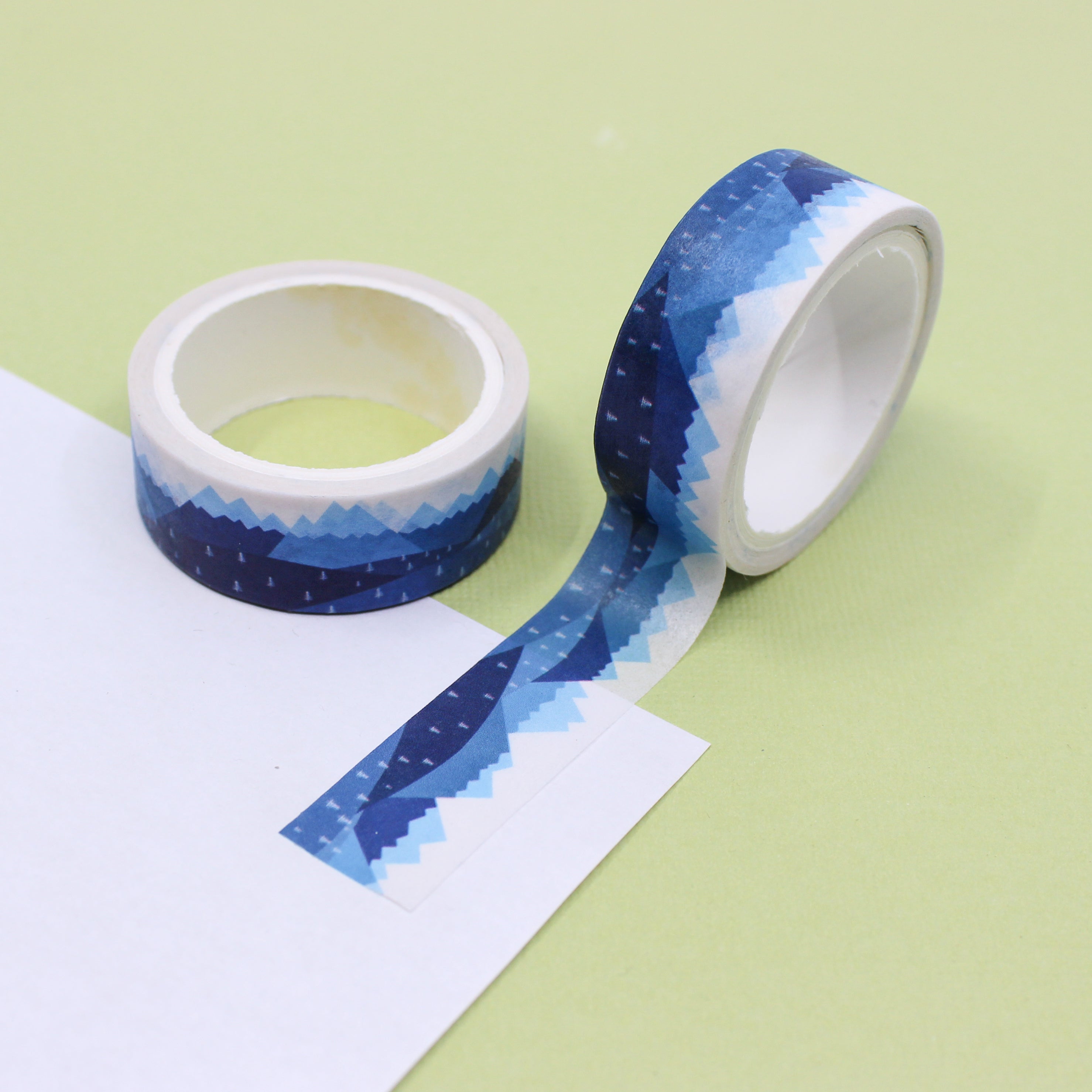 Elevate your crafts with our captivating blue snowy mountain washi tape, showcasing a peaceful landscape of snow-capped mountains against a serene blue backdrop. This tape is sold at BBB Supplies Craft Shop.