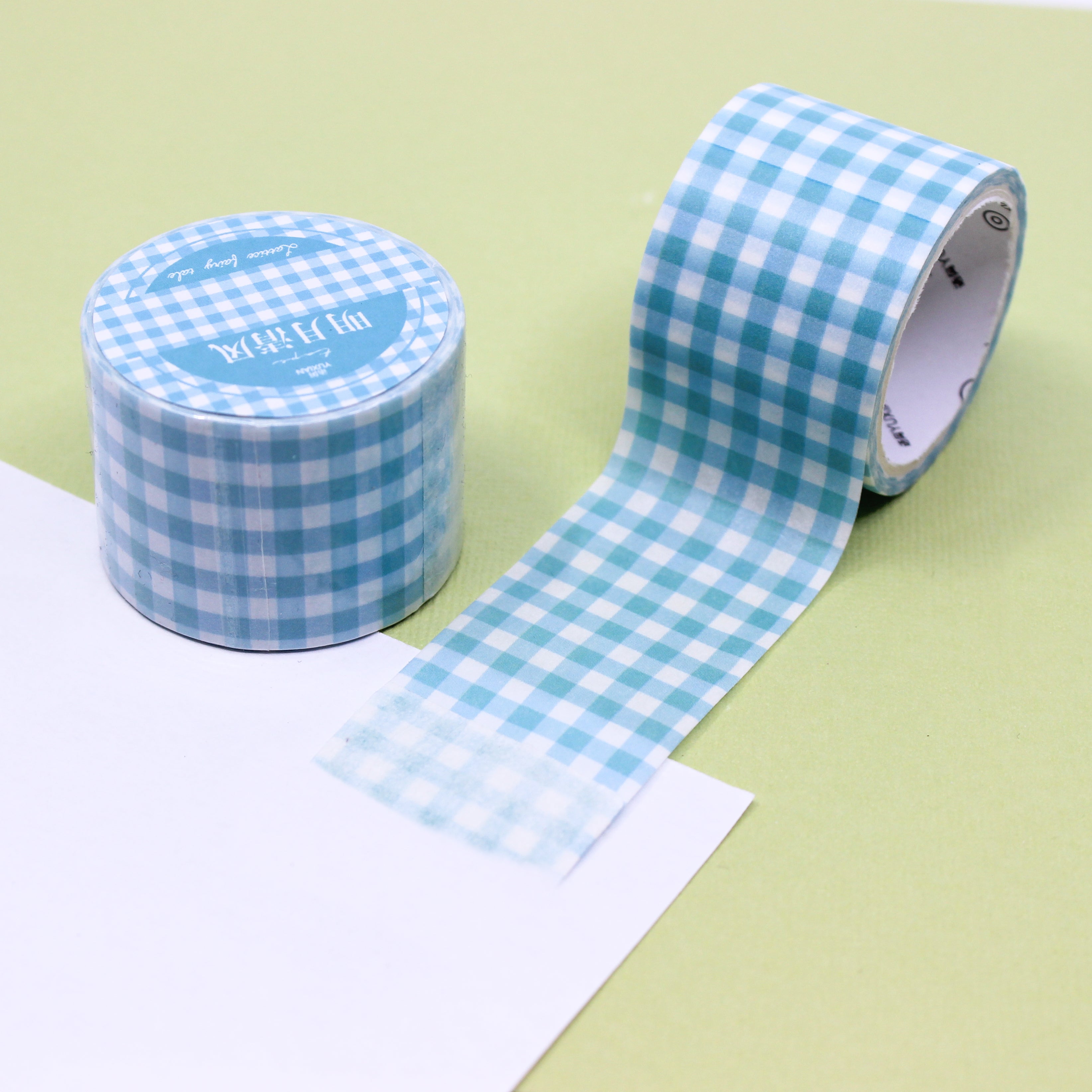 Add a touch of springtime charm to your crafts with our wide plaid washi tape in delightful spring colors, featuring a vibrant and playful plaid pattern perfect for seasonal projects. These tapes are sold at BBB Supplies Craft Shop.