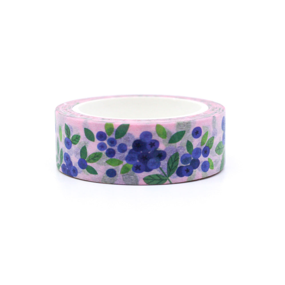 Close-up of Blueberries Washi Tape with a pink background, featuring dark blue berries on a soft pastel pink design, ideal for planners and crafts.