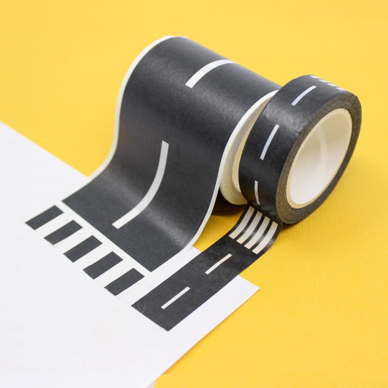 Infuse playtime with creativity using our washi tape adorned with a road design, offering a versatile and interactive way for kids to build their own road networks and embark on exciting journeys. This tape is sold at BBB Supplies Craft Shop.