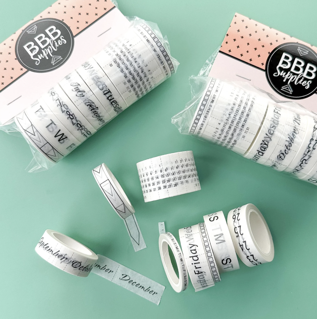 Calendar Spreads Washi Tape Set featuring 8 rolls in black and white, including designs for months, days, calendars, and habit trackers for stylish planning.