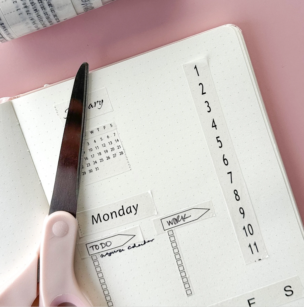 Calendar Spreads Washi Tape Set featuring 8 rolls in black and white, including designs for months, days, calendars, and habit trackers for stylish planning.