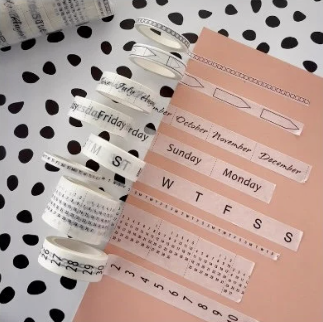 Calendar Spreads Washi Tape Set featuring 8 rolls in black and white, including designs for months, days, calendars, and habit trackers for stylish planning.