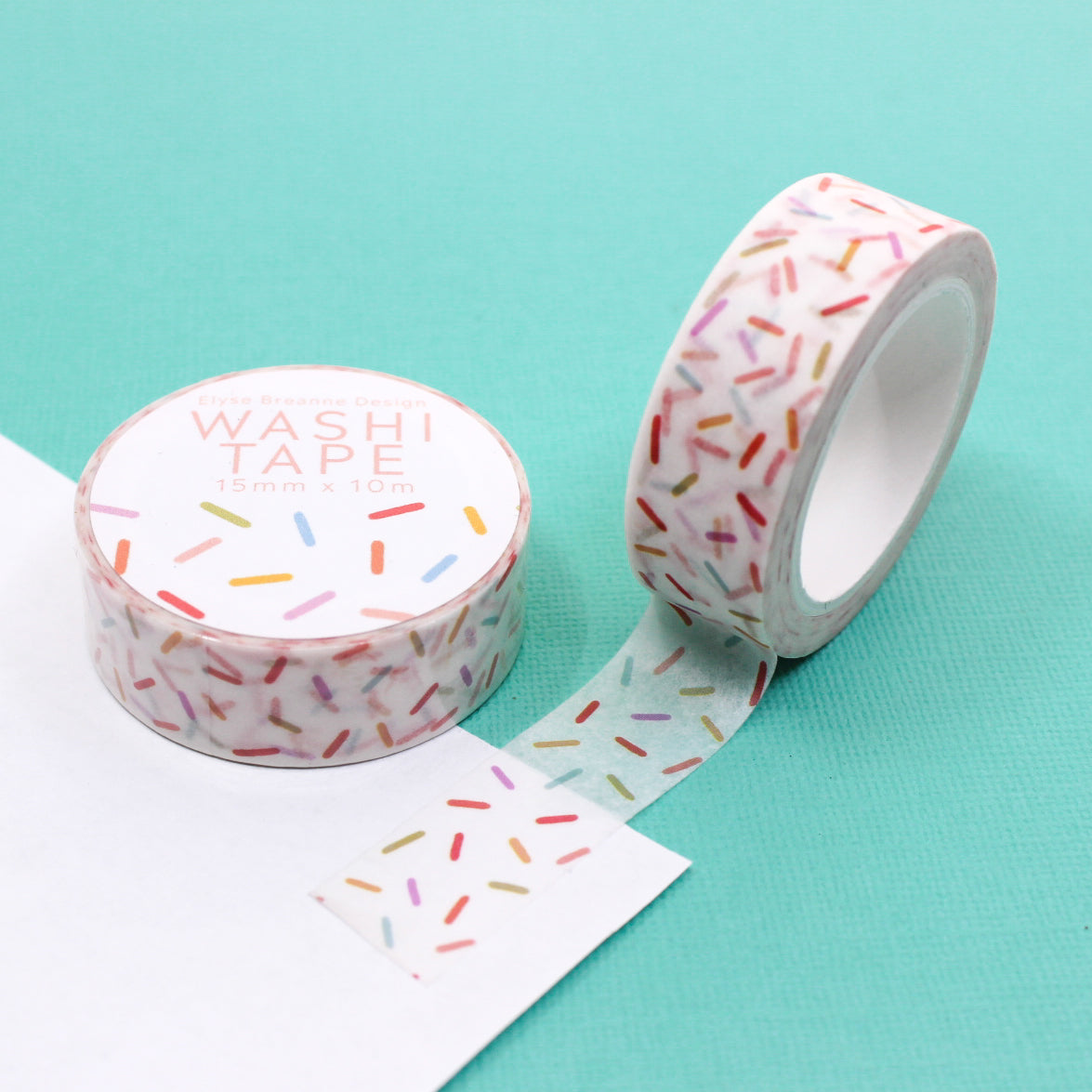 Colorful Sprinkles Washi Tape featuring a vibrant mix of playful sprinkles in various shapes and sizes, perfect for adding a fun and festive touch to your creative projects. This tape is from Elyse Breanne Designs and sold at BBB Supplies Craft Shop.