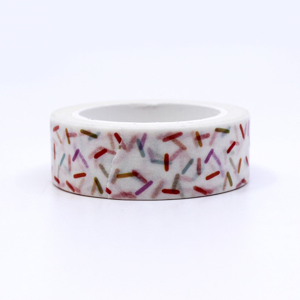 Colorful Sprinkles Washi Tape featuring a vibrant mix of playful sprinkles in various shapes and sizes, perfect for adding a fun and festive touch to your creative projects. This tape is from Elyse Breanne Designs and sold at BBB Supplies Craft Shop.