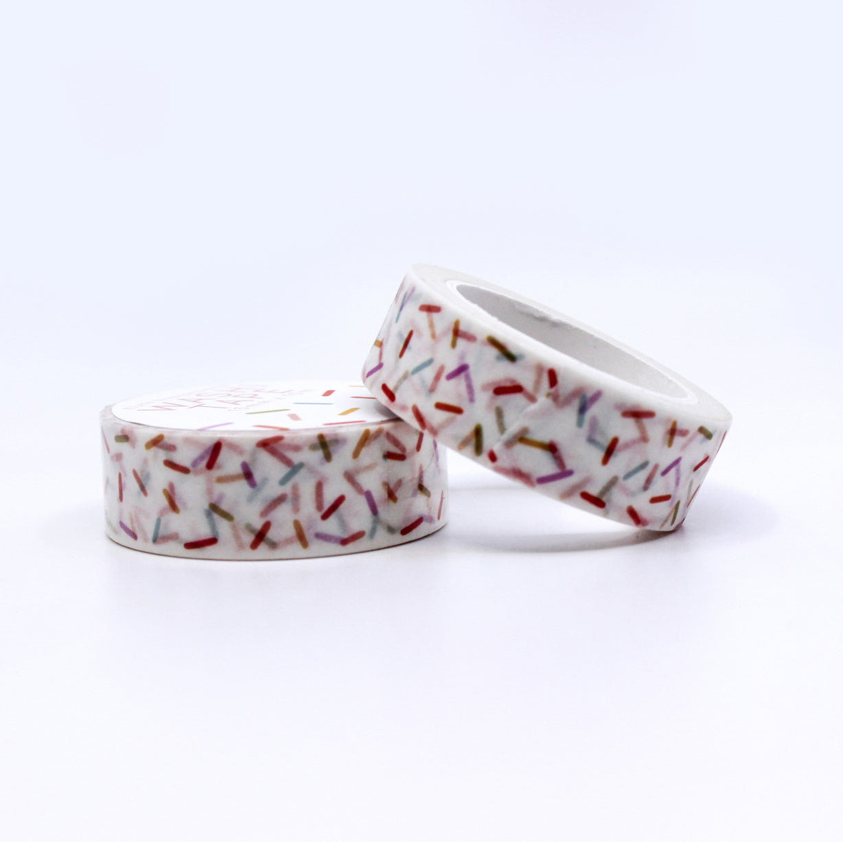 Colorful Sprinkles Washi Tape featuring a vibrant mix of playful sprinkles in various shapes and sizes, perfect for adding a fun and festive touch to your creative projects. This tape is from Elyse Breanne Designs and sold at BBB Supplies Craft Shop.