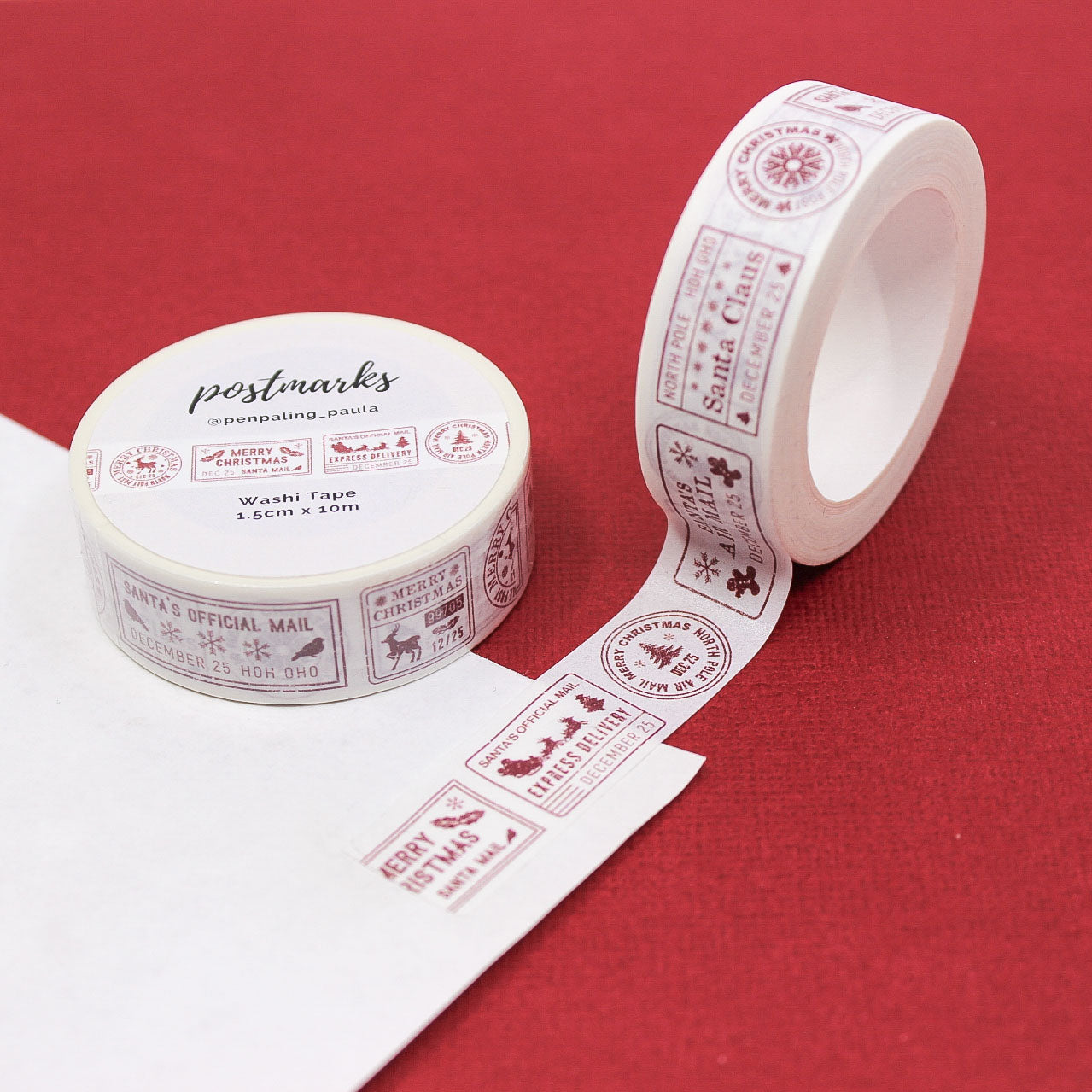 Christmas Postmark Washi Tape with red holiday postmarks on white background