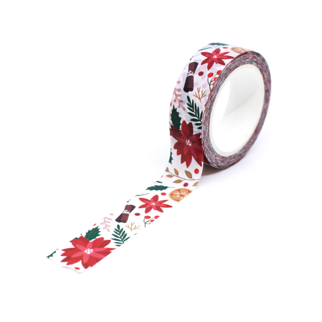 Poinsettia-themed holiday washi tape unrolled on envelope, ideal for scrapbooking and Christmas stationery.