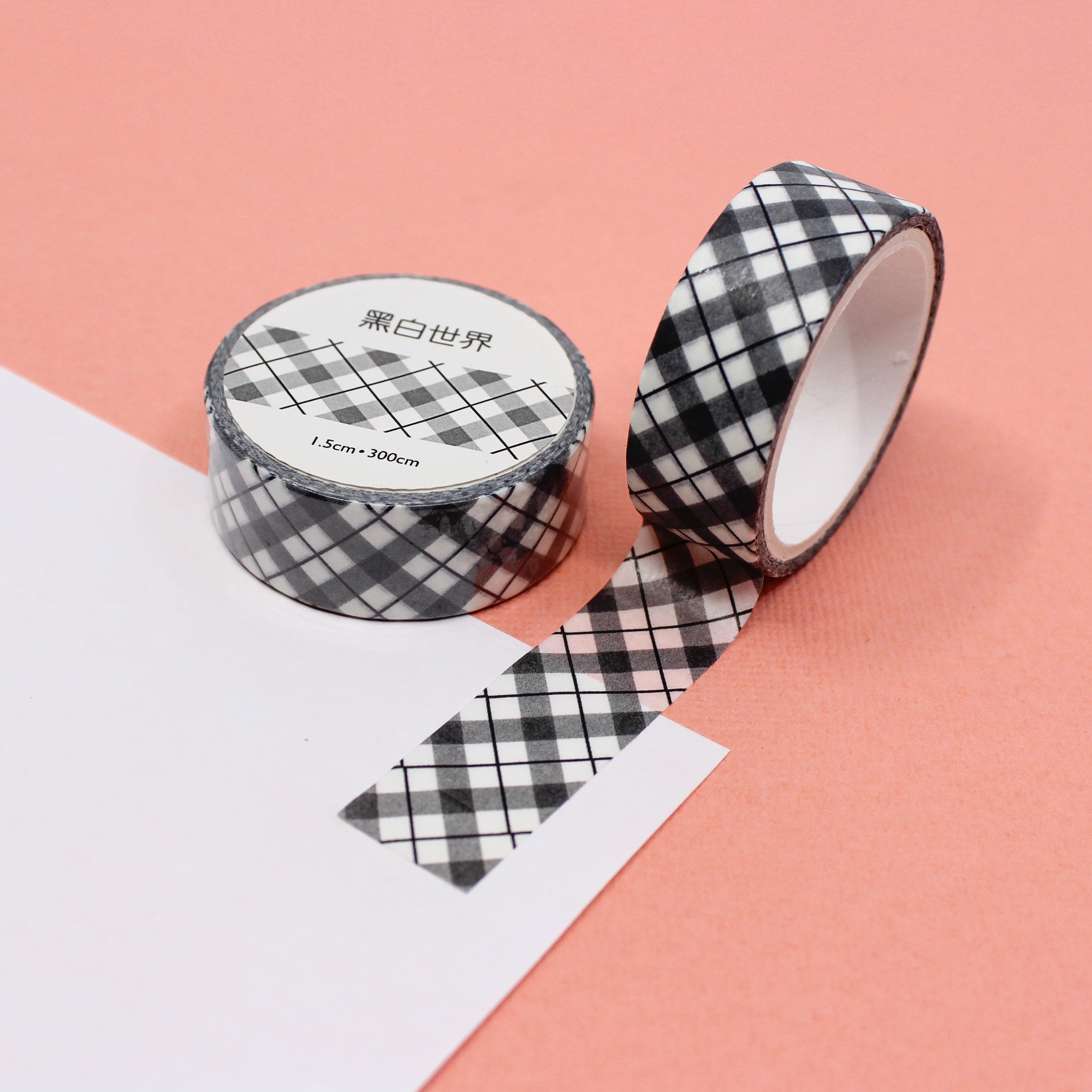 Infuse your projects with a sense of timeless style using our black and white plaid lattice pattern washi tape, adorned with a chic and versatile lattice design. This tape is sold at BBB Supplies Craft Shop.