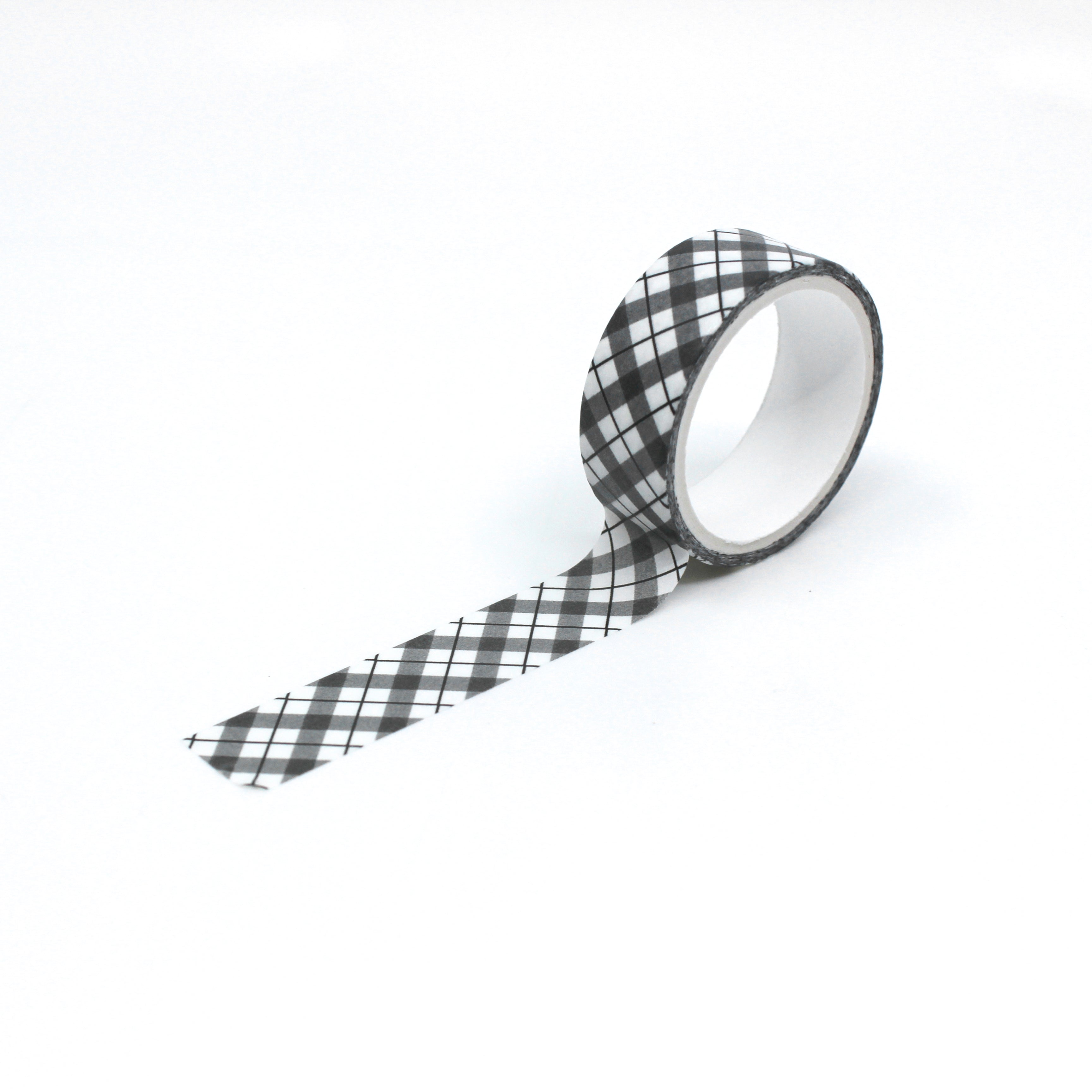 Infuse your projects with a sense of timeless style using our black and white plaid lattice pattern washi tape, adorned with a chic and versatile lattice design. This tape is sold at BBB Supplies Craft Shop.