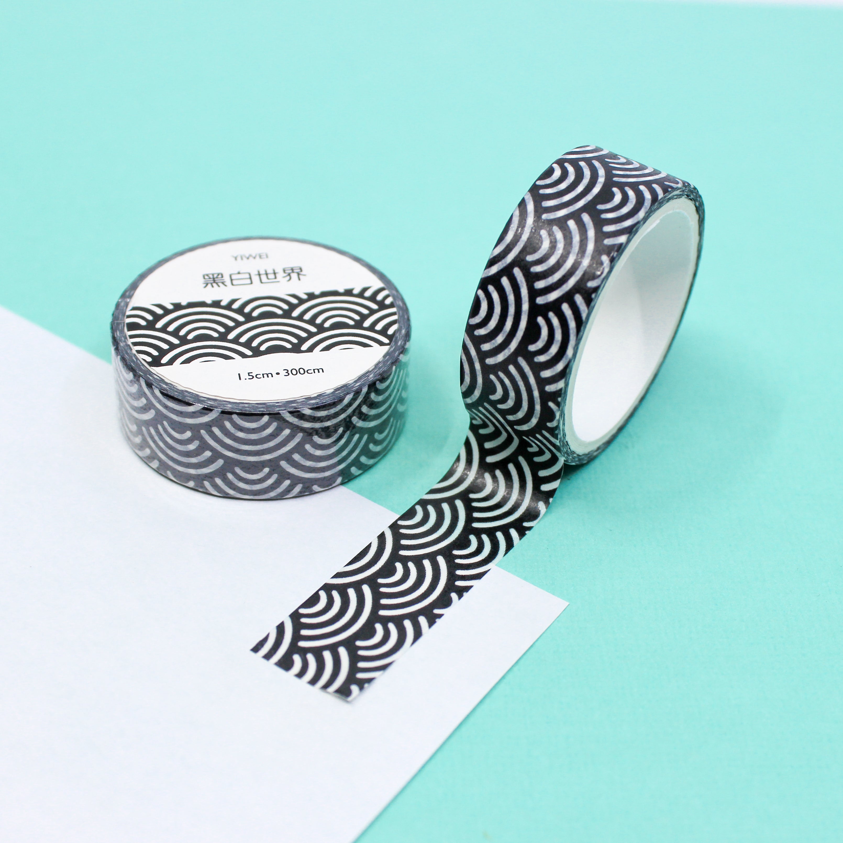 Enhance your crafts with our sophisticated black and white fish scale scallop pattern washi tape, showcasing a stylish and versatile design inspired by the beauty of nature. This tape is sold at BBB Supplies Craft Shop.