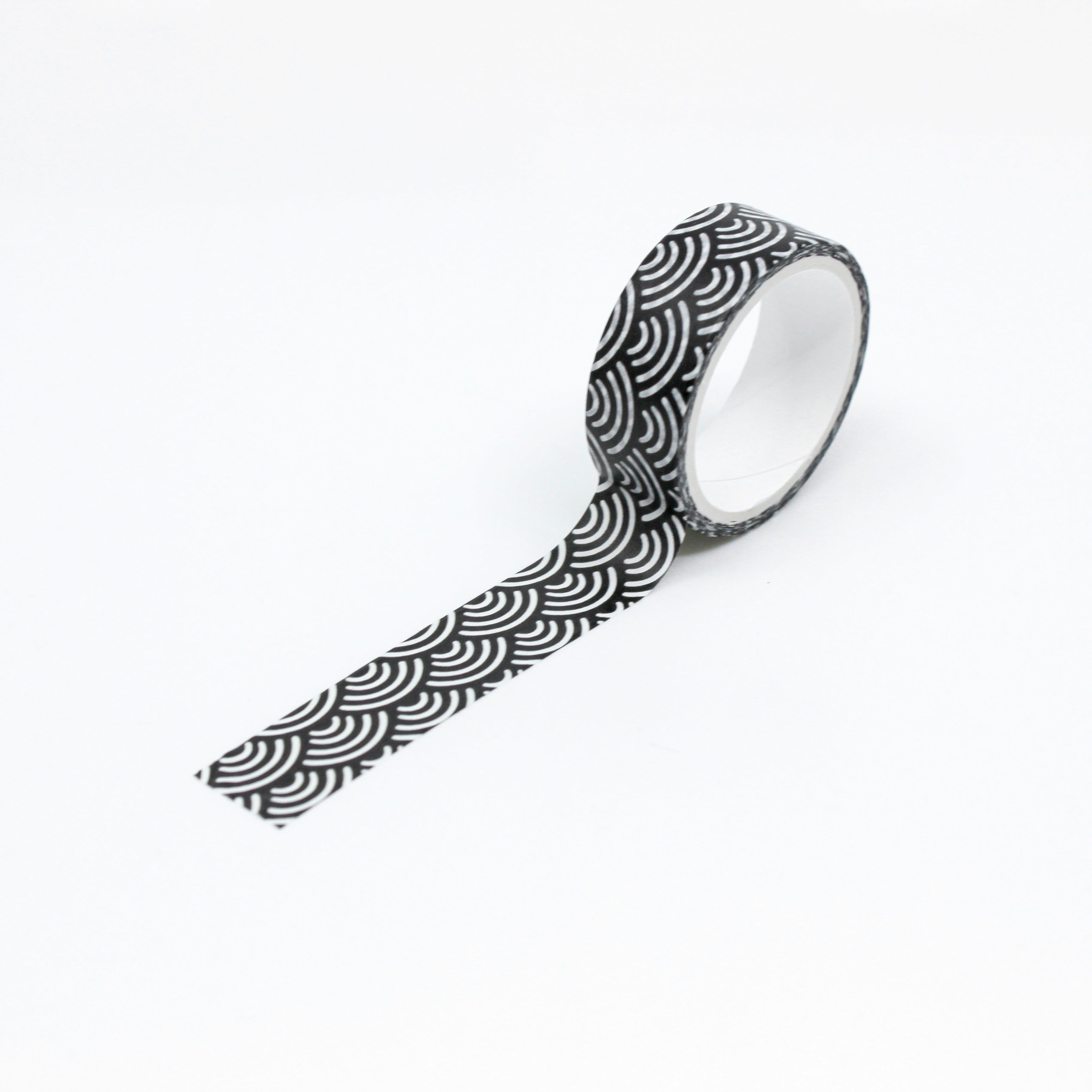 Infuse your projects with a touch of sophistication using our black and white fish scale scallop pattern washi tape, perfect for adding a classic and refined look to your creations. This tape is sold at BBB Supplies Craft Shop.