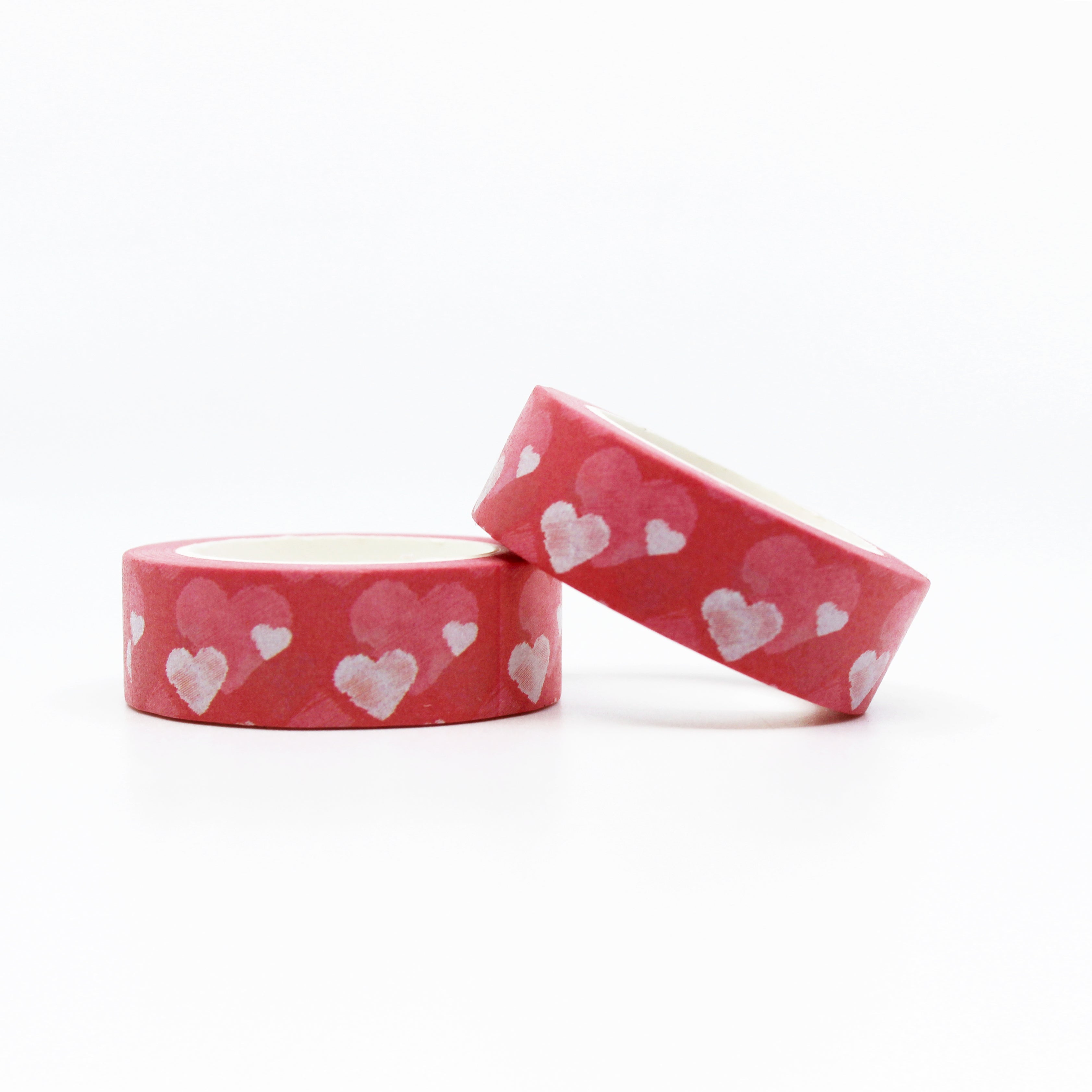 This Layered hearts washi tape beautifully layers pink, red, and white hearts spelling out expressions of love with simply a delicate heart motif. Perfect for adding a romantic touch to your greeting cards, scrapbooks, or gift wrapping, this washi tape exudes warmth and sentiment. This tape is sold at BBB Supplies Craft Shop.