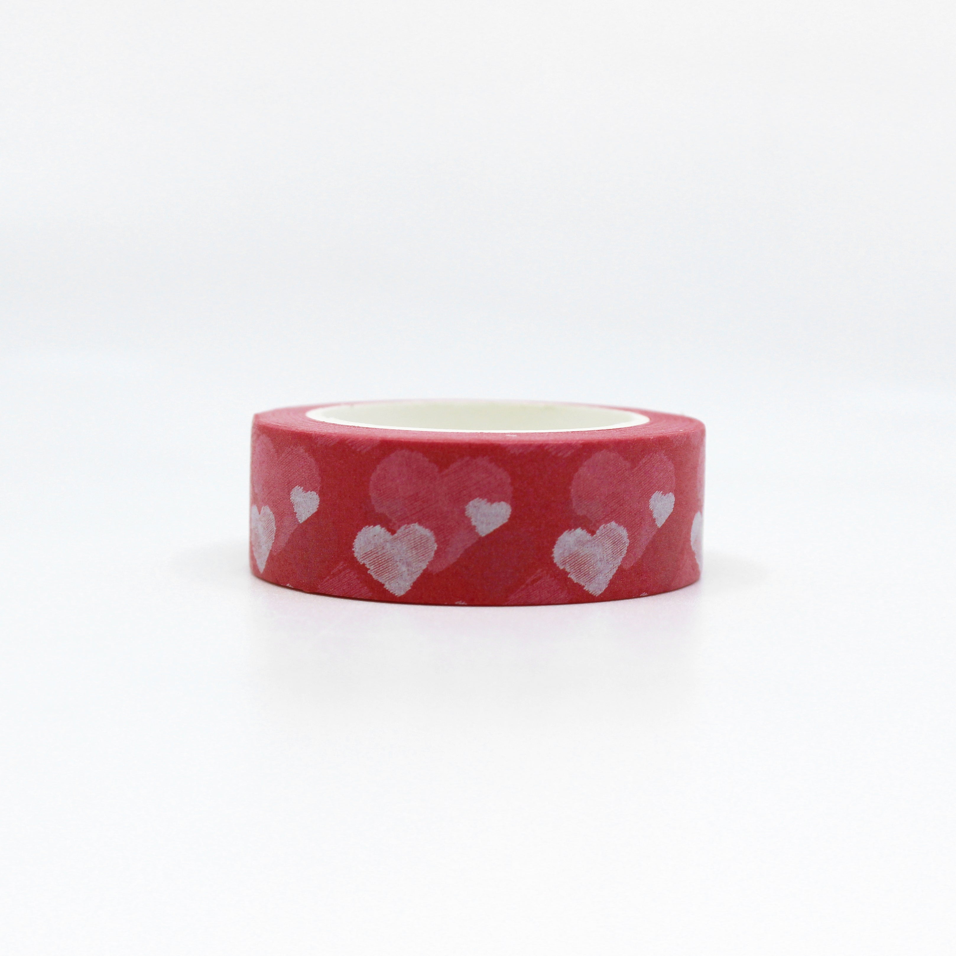 This Layered hearts washi tape beautifully layers pink, red, and white hearts spelling out expressions of love with simply a delicate heart motif. Perfect for adding a romantic touch to your greeting cards, scrapbooks, or gift wrapping, this washi tape exudes warmth and sentiment. This tape is sold at BBB Supplies Craft Shop.