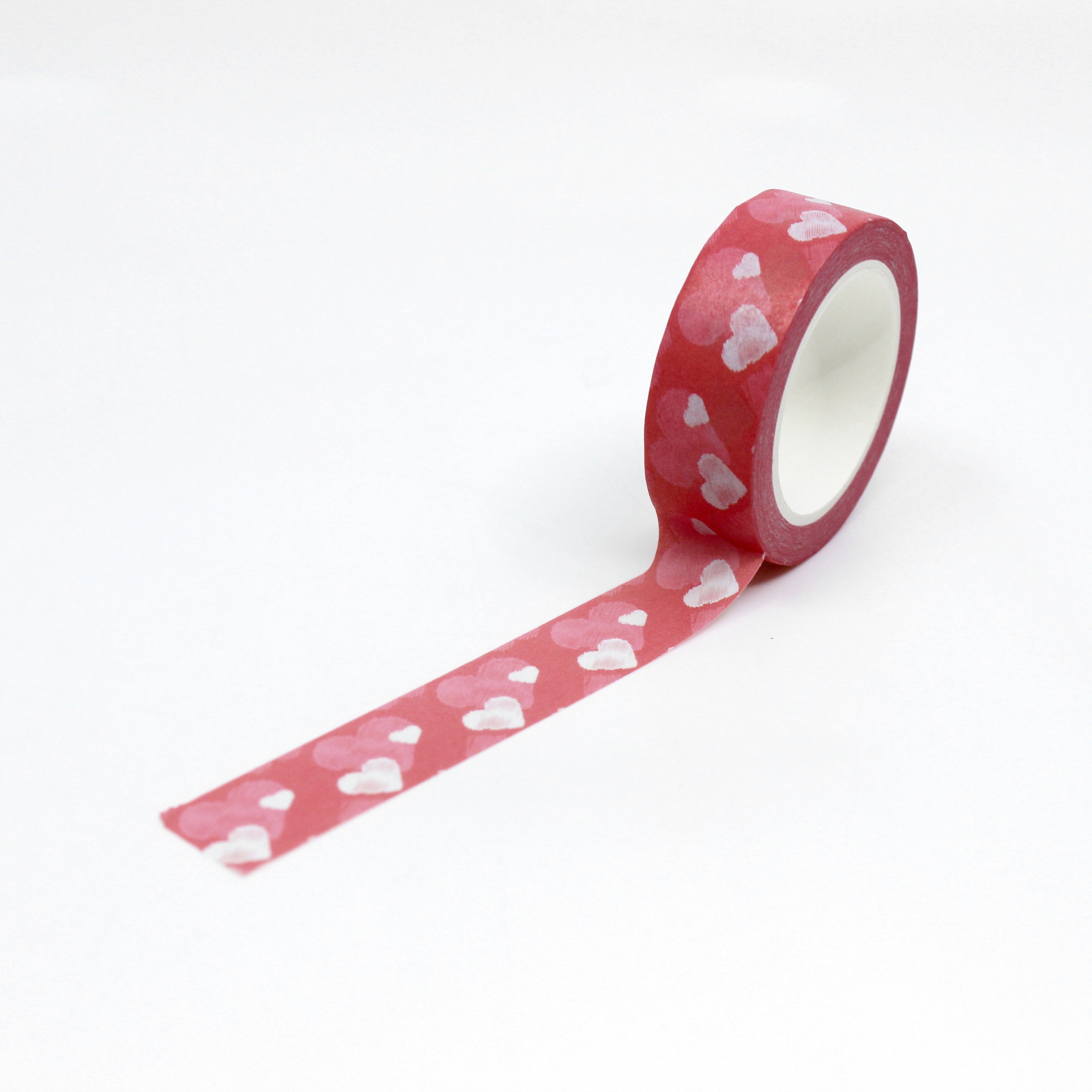 This Layered hearts washi tape beautifully layers pink, red, and white hearts spelling out expressions of love with simply a delicate heart motif. Perfect for adding a romantic touch to your greeting cards, scrapbooks, or gift wrapping, this washi tape exudes warmth and sentiment. This tape is sold at BBB Supplies Craft Shop.