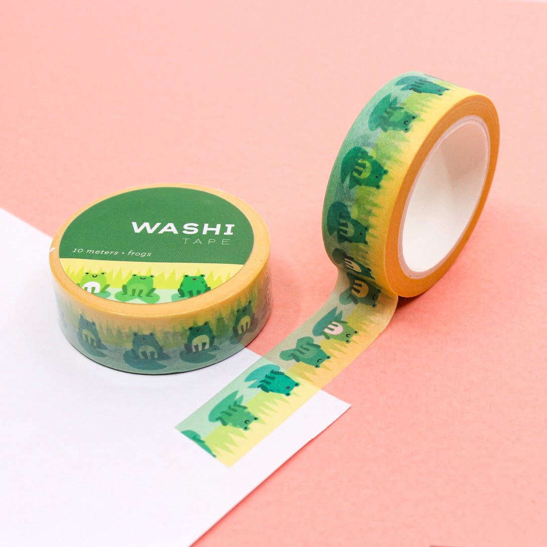  Cute Frog on Lily Pad Washi Tape: Playful design featuring frogs on lily pads. Ideal for nature-themed crafts. This tape is from Girl of All Work and sold at BBB Supplies Craft Shop.