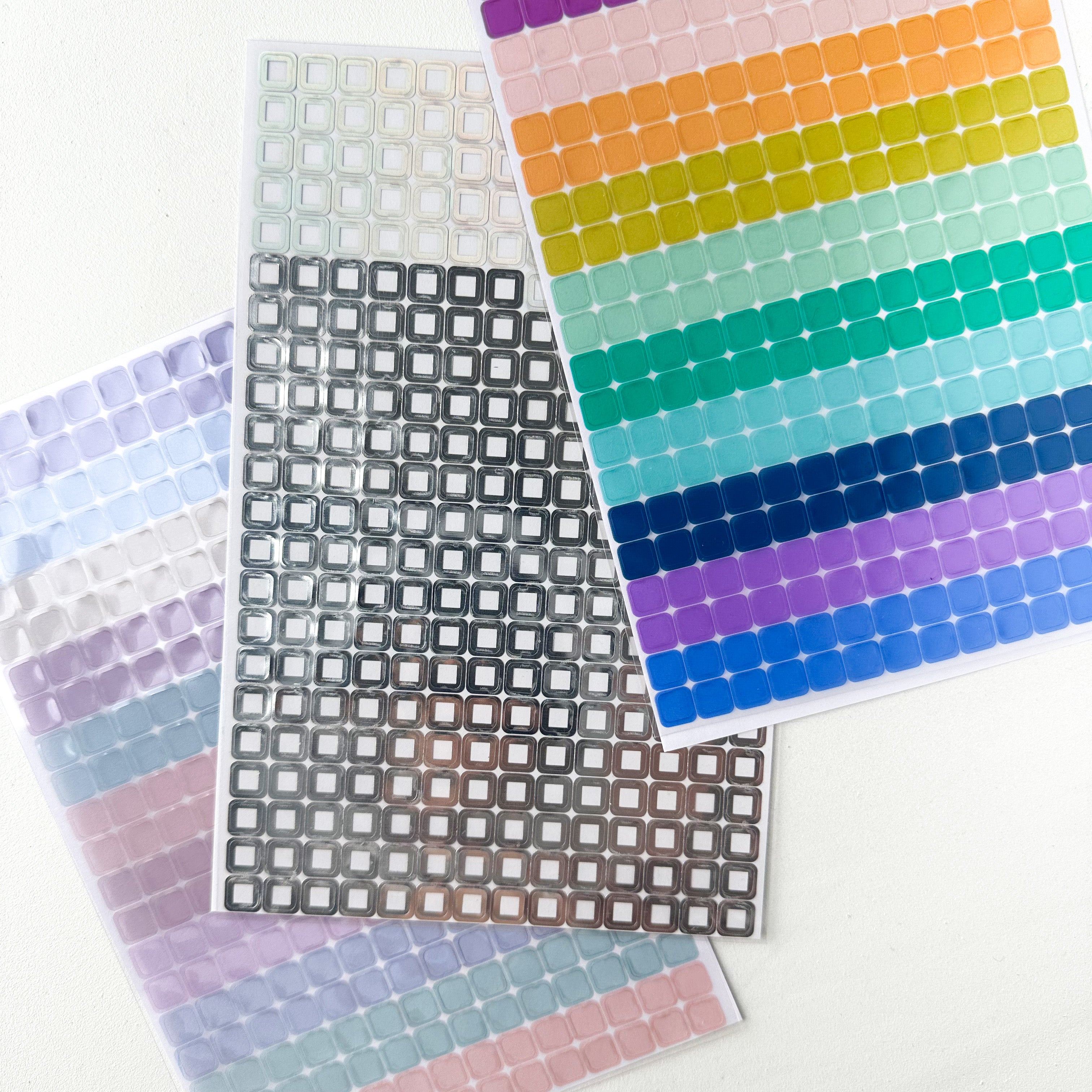 Stay organized and vibrant with our Colorful Square Planner Sticker Pack. This pack features an assortment of square-shaped stickers in a variety of bright colors, perfect for adding a pop of color and functionality to your planner. These Erin Condren Stickers are sold at BBB Supplies Craft Shop.