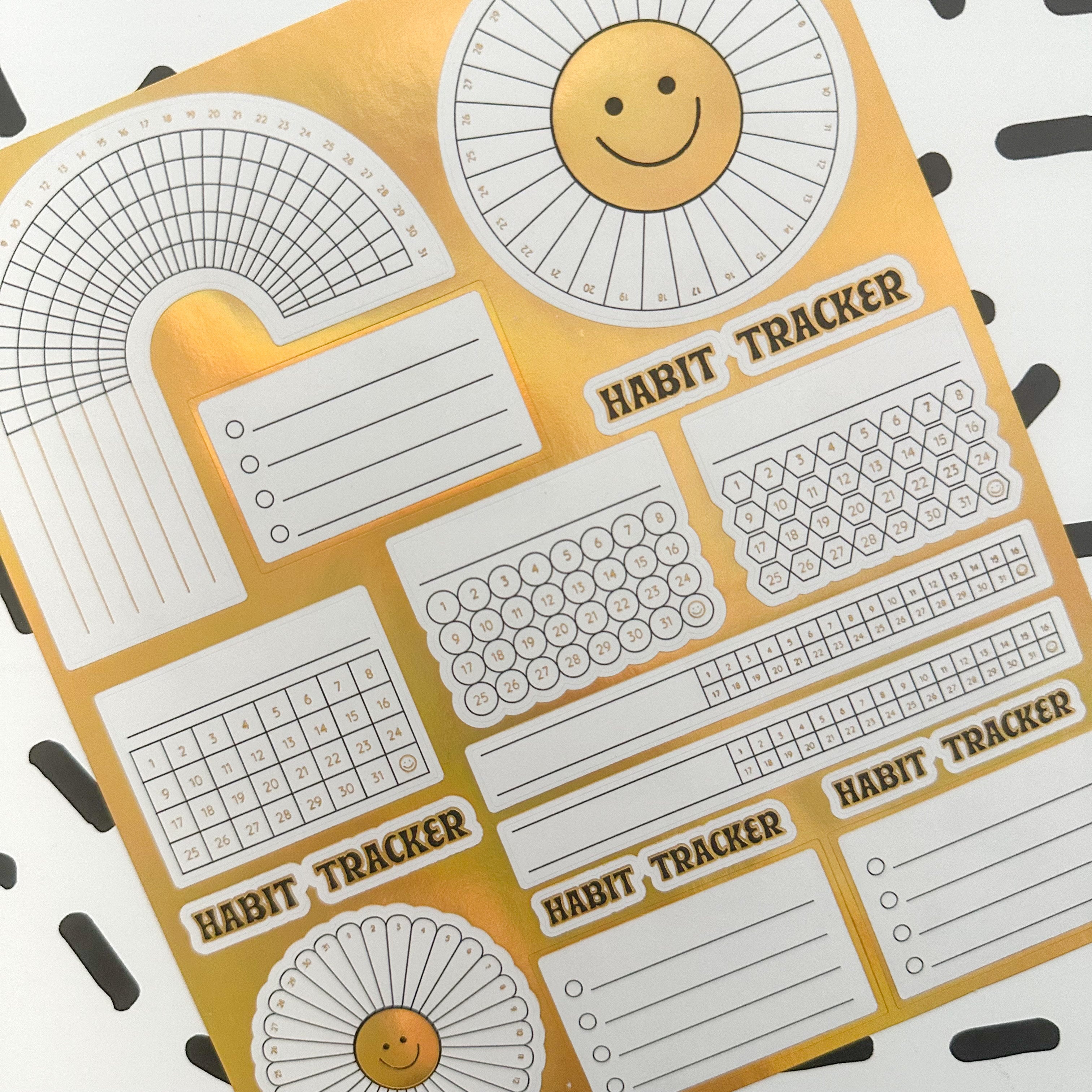 The Gold Foil Habit Tracker Sticker Set is perfect for adding a touch of elegance and organization to your planner or journal. Track all your habits and goals with ease using these stickers.