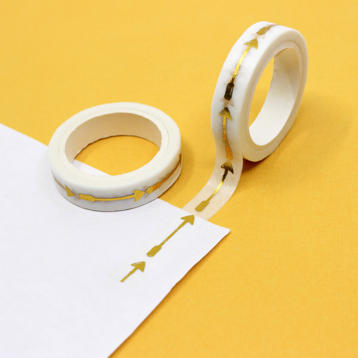 Accentuate your projects with our Gold Foil Arrow Washi Tape, featuring sleek and shimmering gold arrows. Ideal for adding a touch of elegance and direction to your crafts. This tape is sold at BBB Supplies Craft Shop.