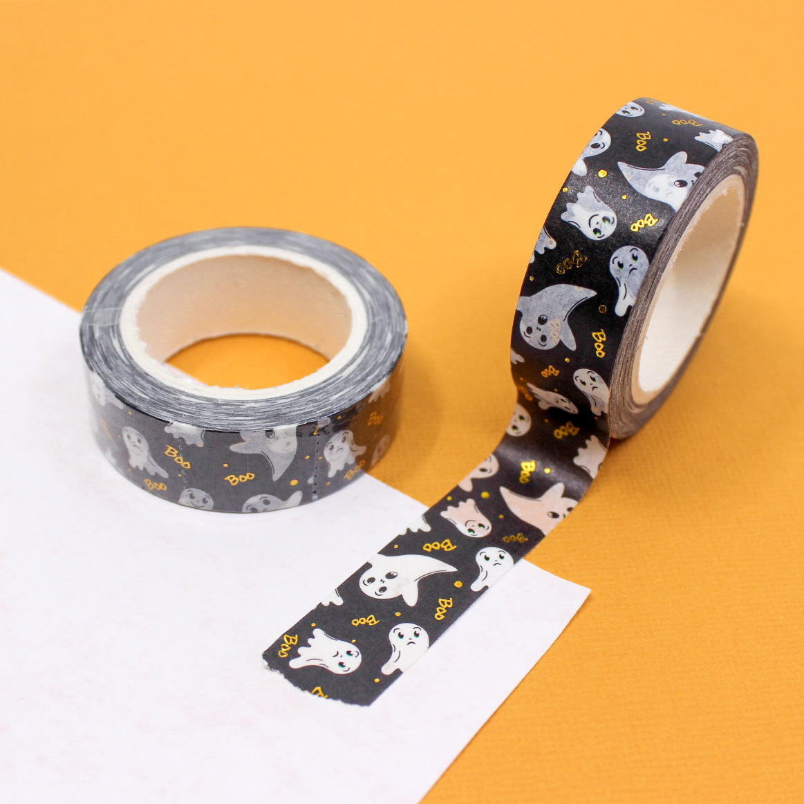 Celebrate Halloween with our Friendly Ghost Gold Foil 'Boo' Halloween Washi Tape, featuring adorable ghost and 'Boo' designs in shimmering gold foil. Ideal for adding a festive and spooky touch to your projects. This tape is sold at BBB Supplies Craft Shop.