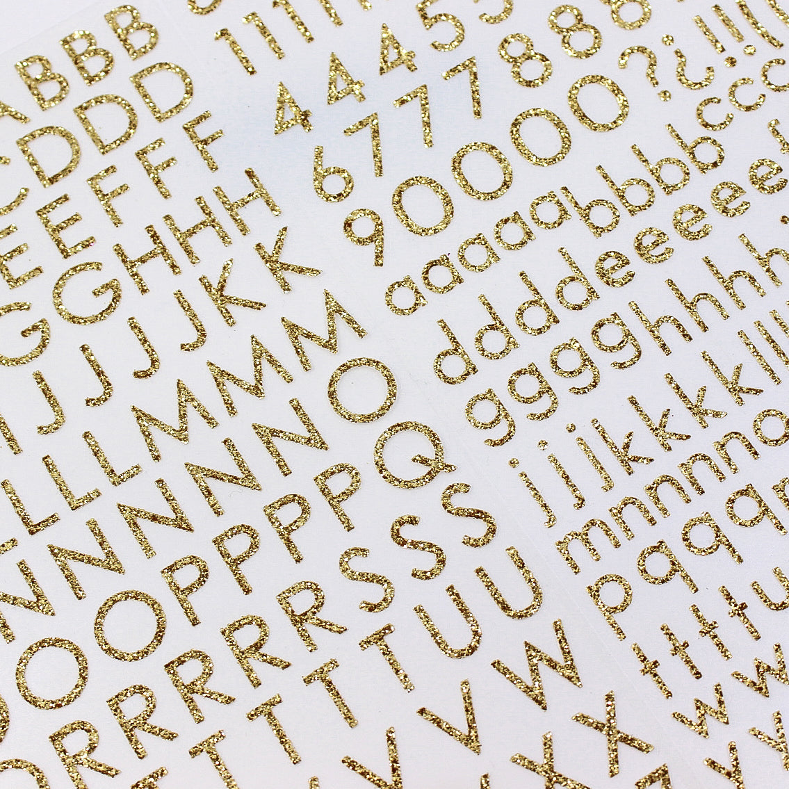 Add sparkle to your crafts with our glitter gold color letter stickers, featuring a shimmering assortment of letters in a vibrant spectrum of colors. These letter stickers are sold at BBB Supplies Craft Shop.