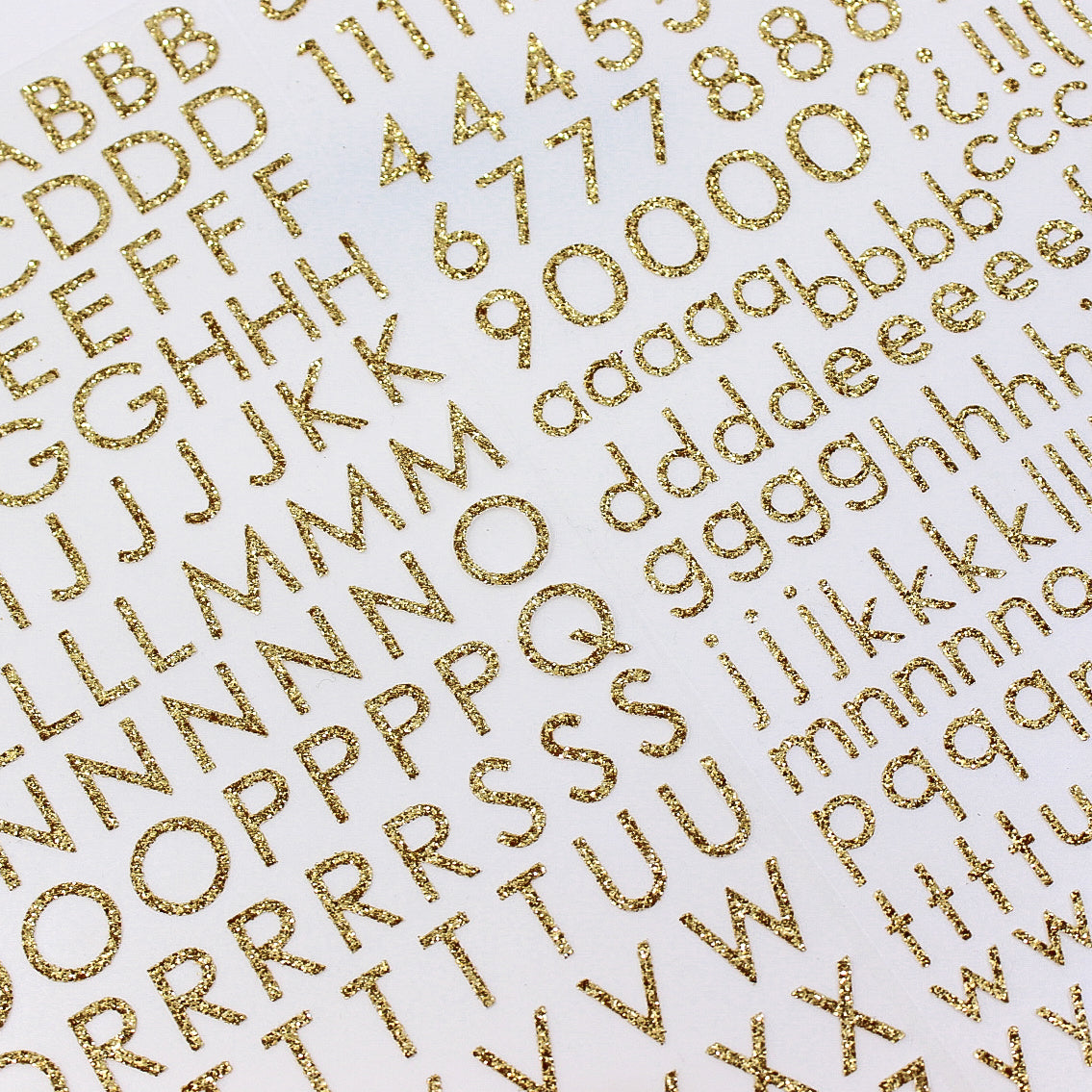  Add sparkle to your crafts with our glitter gold color letter stickers, featuring a shimmering assortment of letters in a vibrant spectrum of colors. These letter stickers are sold at BBB Supplies Craft Shop.