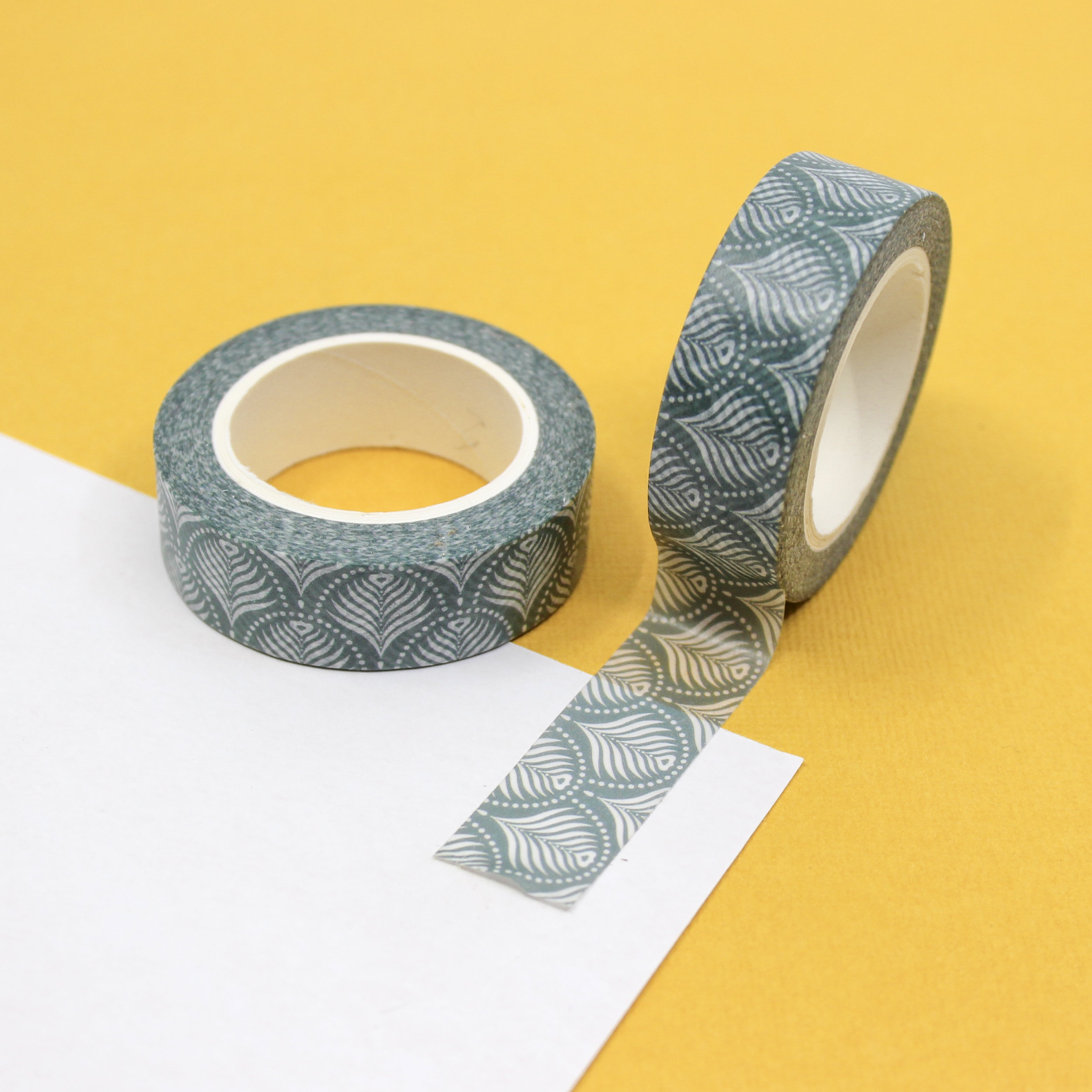Easter Green Palm Pattern Washi Tape: Add a tropical touch to your Easter crafts with our Green Palm Pattern Washi Tape. This tape features a fun and festive palm leaf design in shades of green, perfect for adding a pop of color to your projects. Whether you're decorating Easter cards, creating scrapbook layouts, or embellishing gift wrap, this tape is sure to add a touch of springtime cheer. This tape is sold at BBB Supplies Craft Shop.