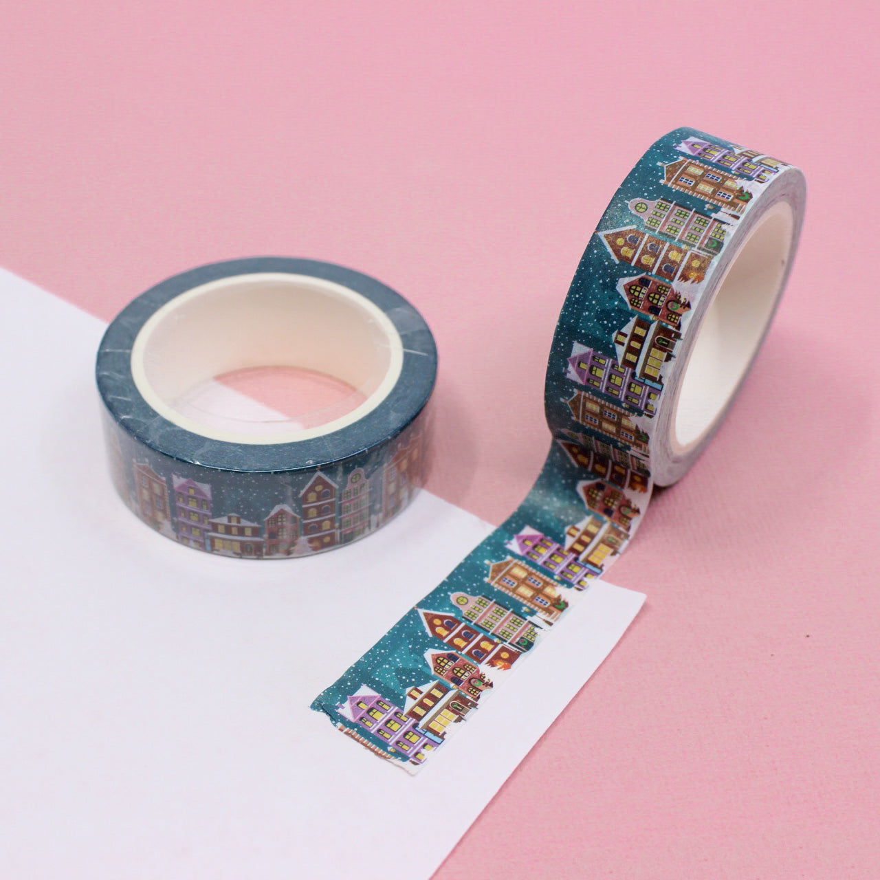 Add a whimsical touch to your holiday crafts with this delightful washi tape featuring a charming Santa's village design. Perfect for decorating cards, gift wrap, and more, this tape is sure to spread holiday cheer! This tape is sold at BBB Supplies Craft Shop.