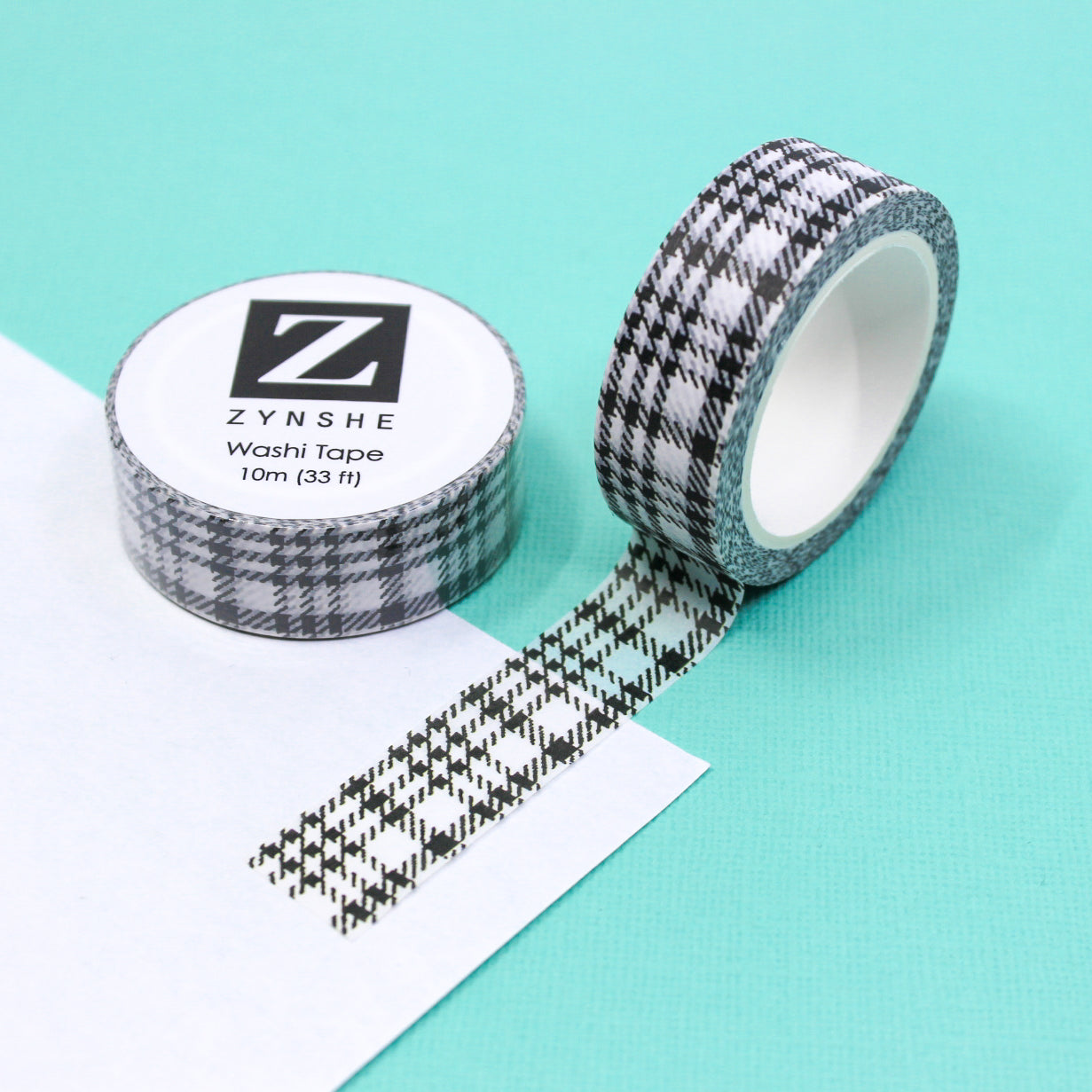 Capture attention and inspire creativity with our exquisite black and white houndstooth washi tape. The tape features a classic houndstooth pattern, adding a touch of elegance and sophistication to your craft projects. Use this premium-quality decorative tape to elevate your artistic creations and bring your ideas to life from BBB Supplies Craft Shop.