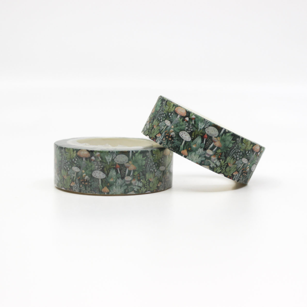 Enchant your projects with this whimsical washi tape featuring a mystical forest scene of mushrooms and foliage, ideal for nature-themed crafts and journals. This tape is sold at BBB Supplies Craft Shop.