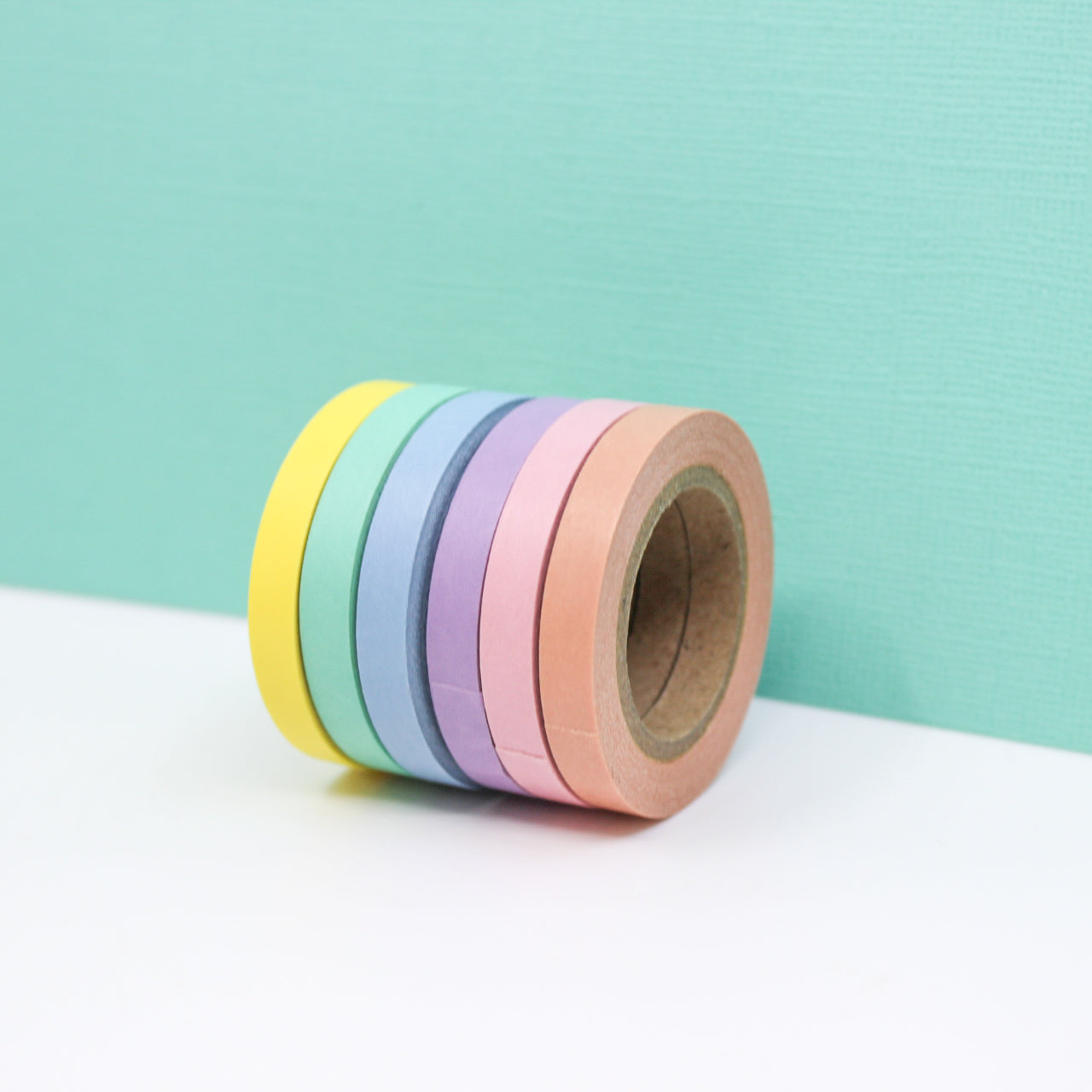 Add a gentle touch to your crafts with our Pastel Color Narrow Solid Washi Tape Set. This set includes a variety of narrow washi tapes in soft pastel hues, ideal for adding a delicate and soothing touch to your projects. This tape is sold at BBB Supplies Craft Shop.