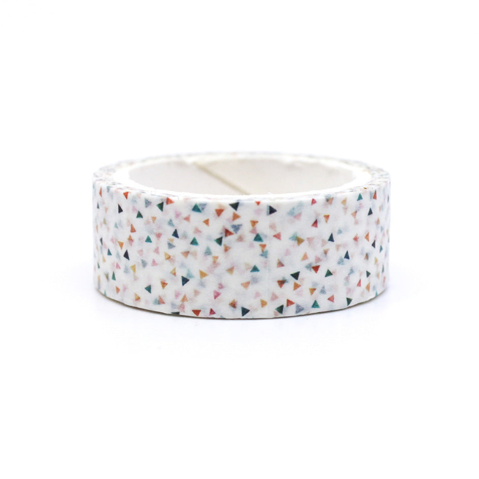 A lively washi tape adorned with colorful triangle confetti patterns, ideal for bringing a playful touch to your planners, scrapbooks, and creative projects. This tape is sold at BBB Supplies Craft Shop!