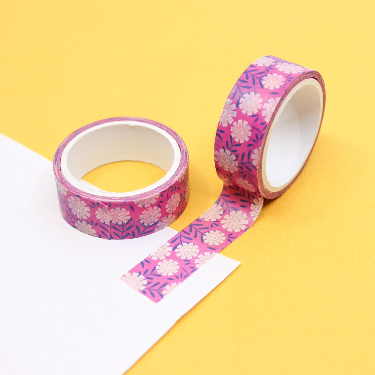 Elevate your crafts with our Pink Daisy Floral Washi Tape, featuring charming daisy motifs in a delightful shade of pink. Ideal for adding a touch of floral elegance to your projects. This tape is sold at BBB Supplies Craft Shop.