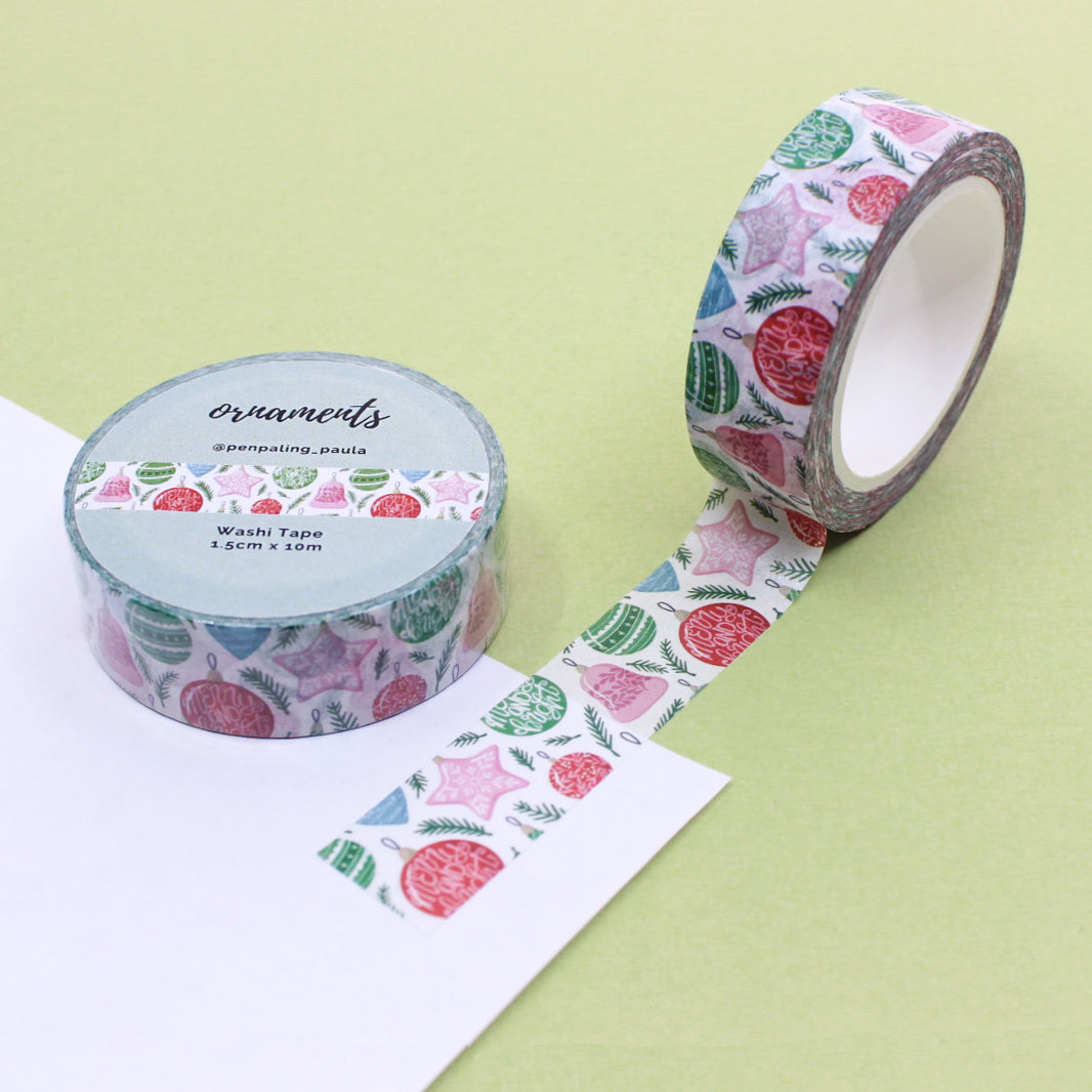 Pink Christmas Ornaments Washi Tape with festive holiday bauble designs, perfect for adding a touch of elegance to your seasonal crafts. This tape is from PenPaling Paula and sold at BBB Supplies Craft Shop.