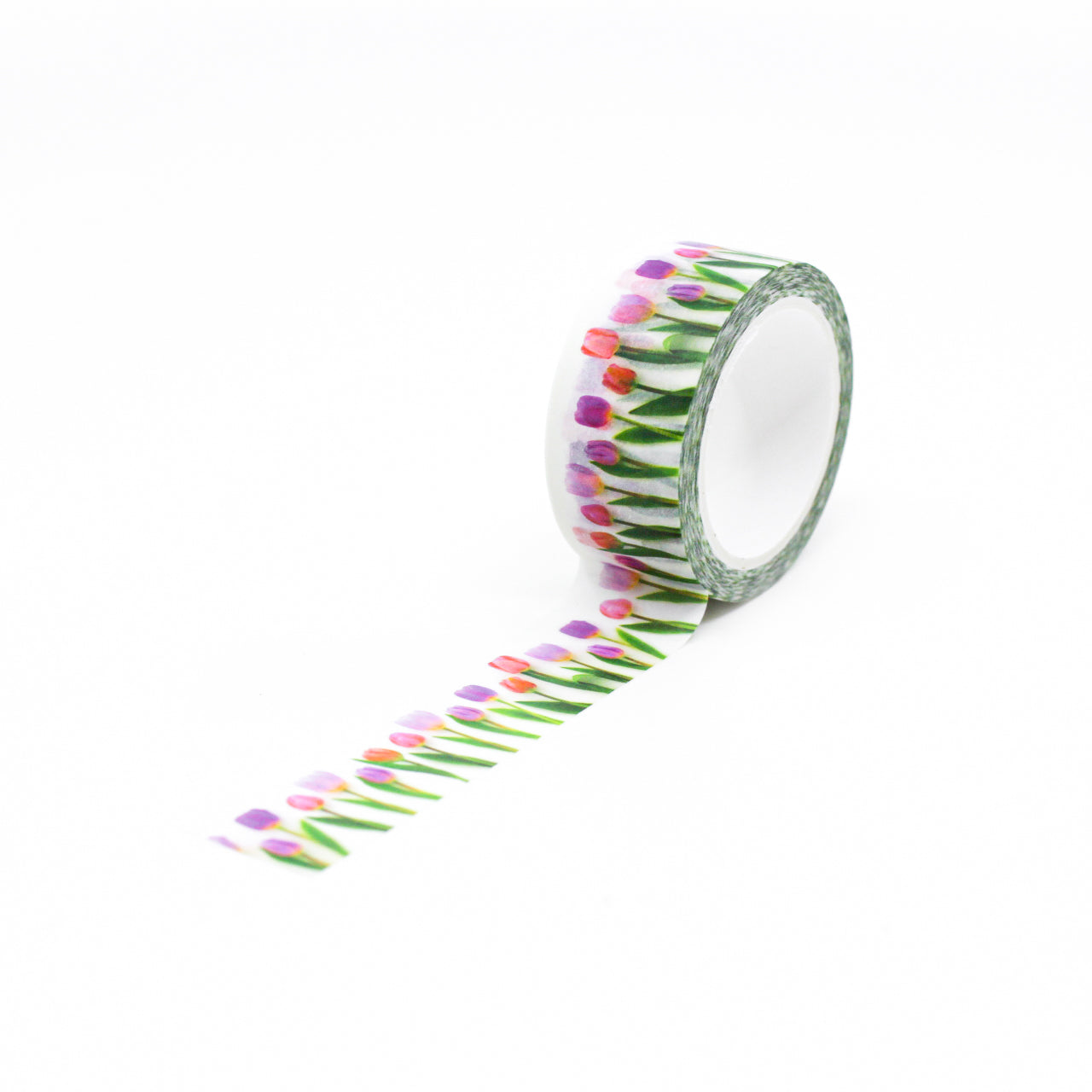 Add a touch of floral elegance with our charming pink tulip washi tape, featuring graceful tulip flowers in varying shades of pink. Capture the essence of blooming gardens with our pink tulip washi tape, showcasing vibrant tulip blossoms in delightful shades of pink. This tape is designed by Bottle Branch and sold at BBB Supplies Craft Shop.