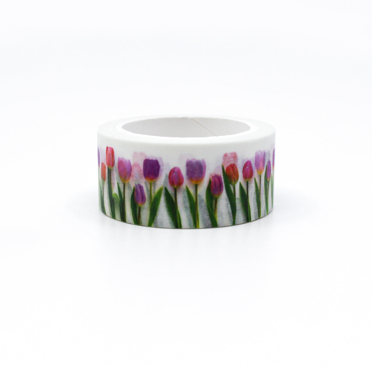Add a touch of floral elegance with our charming pink tulip washi tape, featuring graceful tulip flowers in varying shades of pink. Capture the essence of blooming gardens with our pink tulip washi tape, showcasing vibrant tulip blossoms in delightful shades of pink. This tape is designed by Bottle Branch and sold at BBB Supplies Craft Shop.