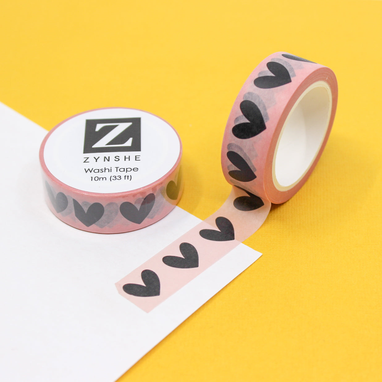 Adorn your planner or journal with our charming black hand-drawn heart washi tape on a vibrant pink backdrop, This tape is sold at BBB Supplies Craft Shop.