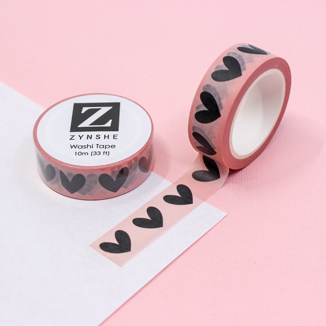 Adorn your planner or journal with our charming black hand-drawn heart washi tape on a vibrant pink backdrop, This tape is sold at BBB Supplies Craft Shop.