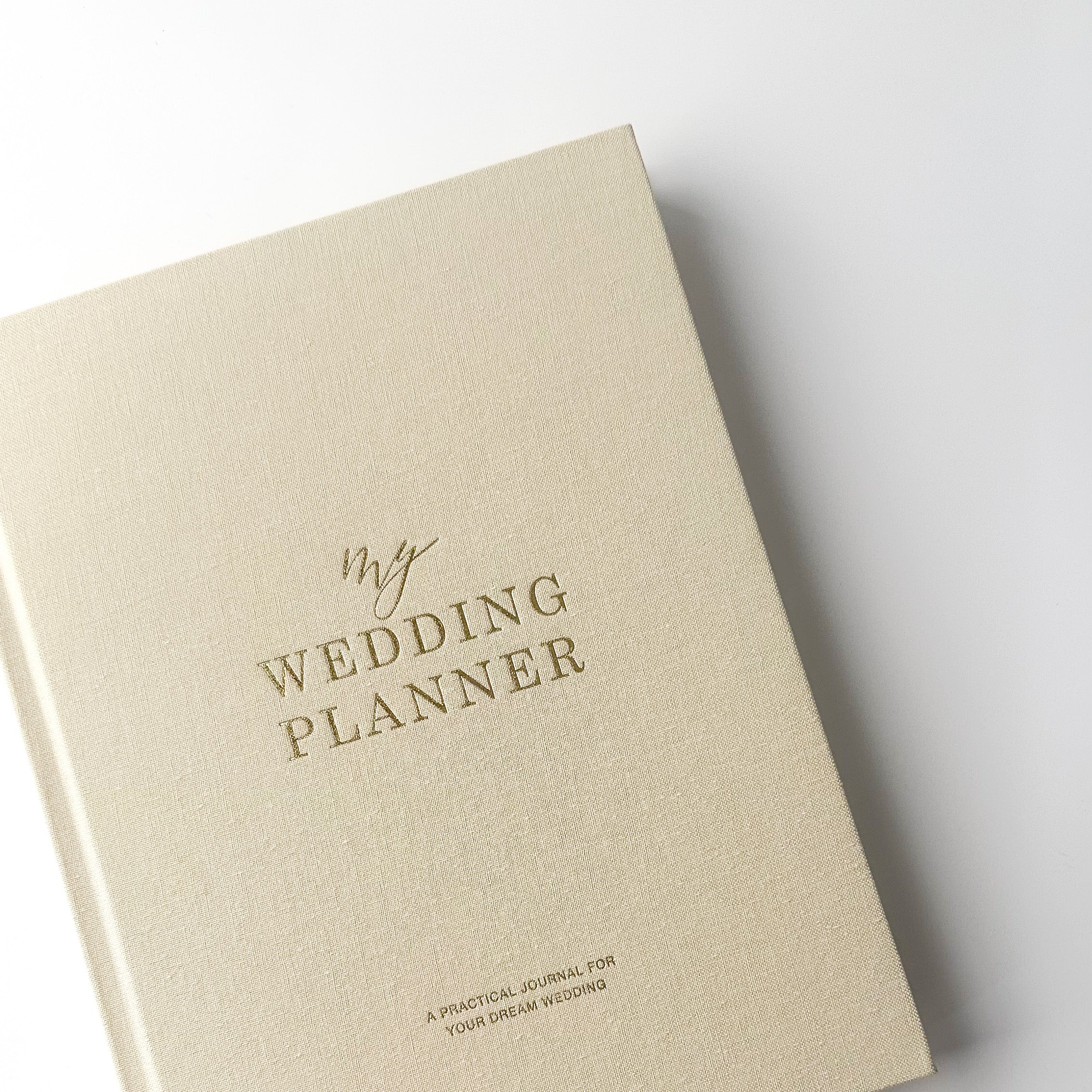 Ivory Wedding Planner featuring sections for budgeting, guest lists, venue selection, vendor coordination, and wedding timelines for stress-free planning.