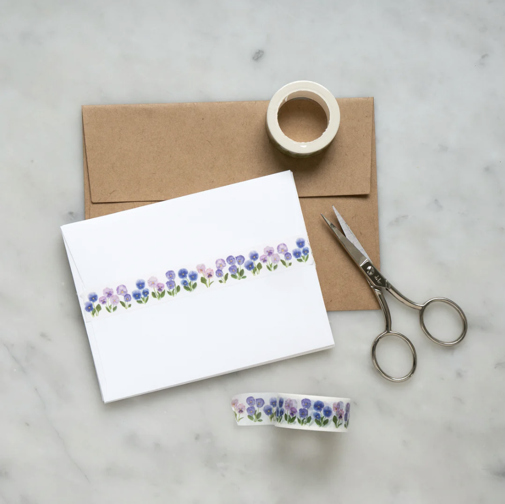 Adorn your projects with the charm of purple pansies using our exquisite purple pansy washi tape, showcasing delicate and vibrant floral patterns and Elevate your crafts with our captivating purple pansy washi tape. This tape is designed by Bottle Branch and sold at BBB Supplies Craft Shop.