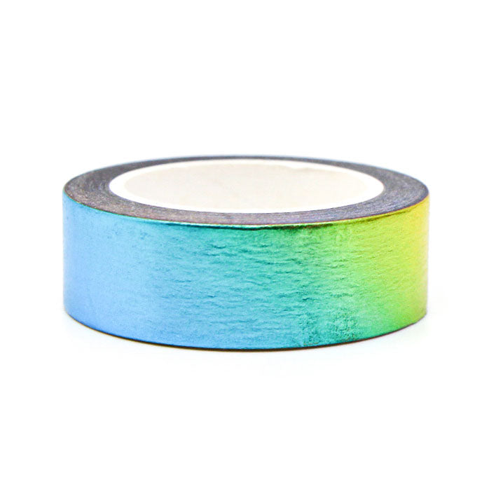 Ombre metallic washi tape in rainbow colors on a roll