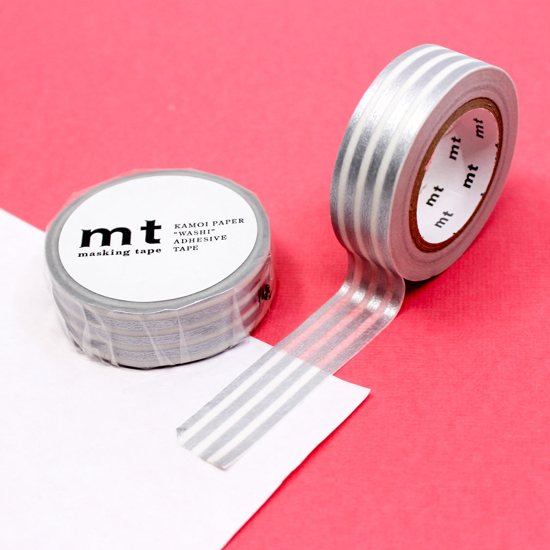 Enhance your crafts with our thicker line horizontal stripe washi tape, featuring bold and stylish stripes in a variety of colors, perfect for adding a dynamic and vibrant element to your projects. This silver stripe tape is from MT Brand Masking Tape and sold at BBB Supplies Craft Shop.