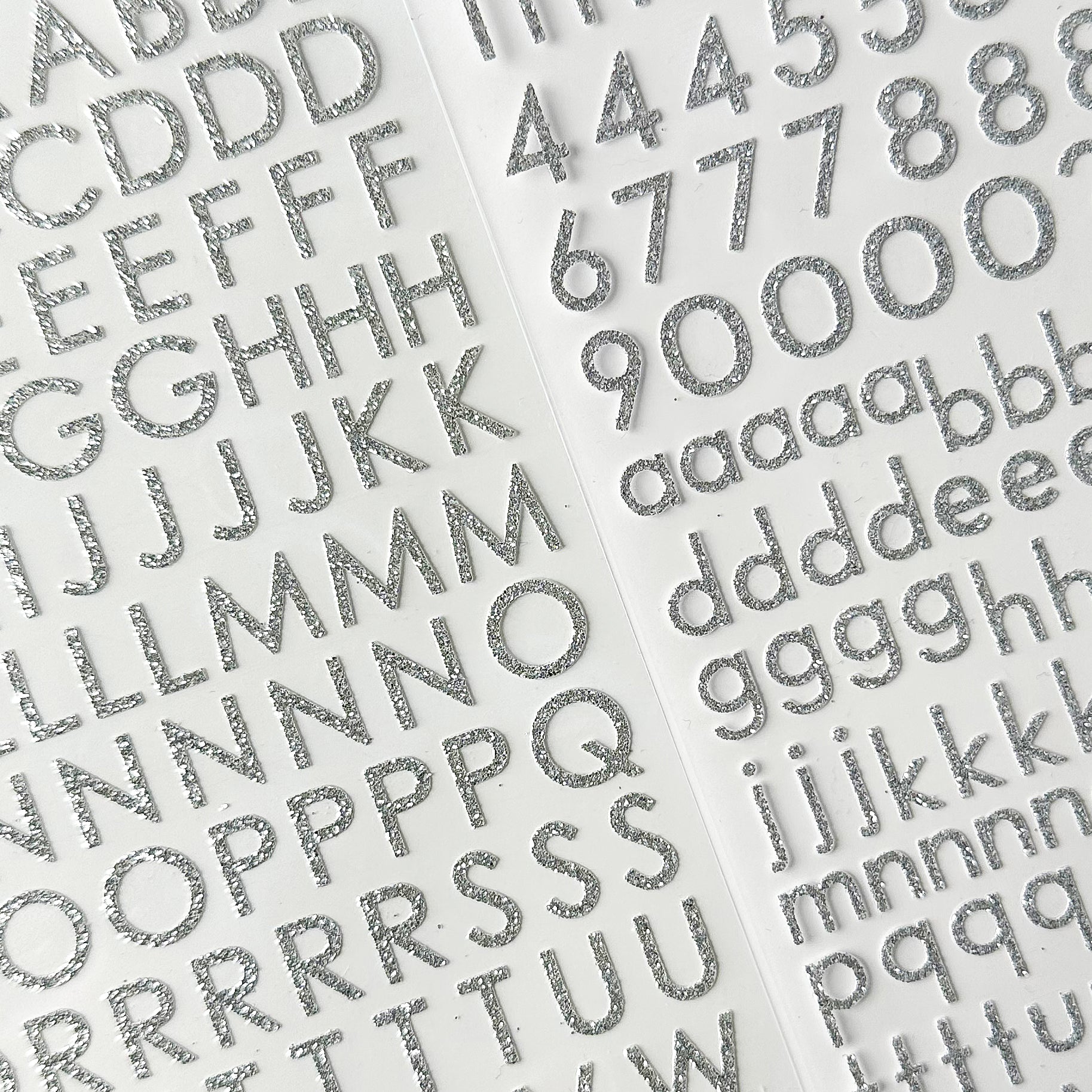 Add sparkle to your crafts with our glitter silver color letter stickers, featuring a shimmering assortment of letters in a vibrant spectrum of colors. These letter stickers are sold at BBB Supplies Craft Shop.