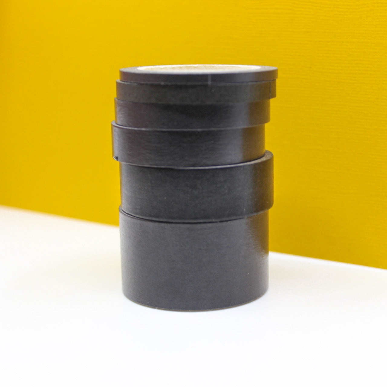 Infuse your projects with the elegance of black using our washi tape, adorned with a solid black design that adds a timeless and sophisticated element to your crafts. This tape is sold at BBB Supplies Craft Shop.